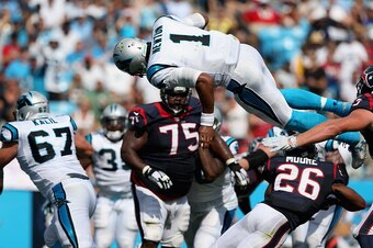 Cam Newton and the Panthers soared over the Texans.