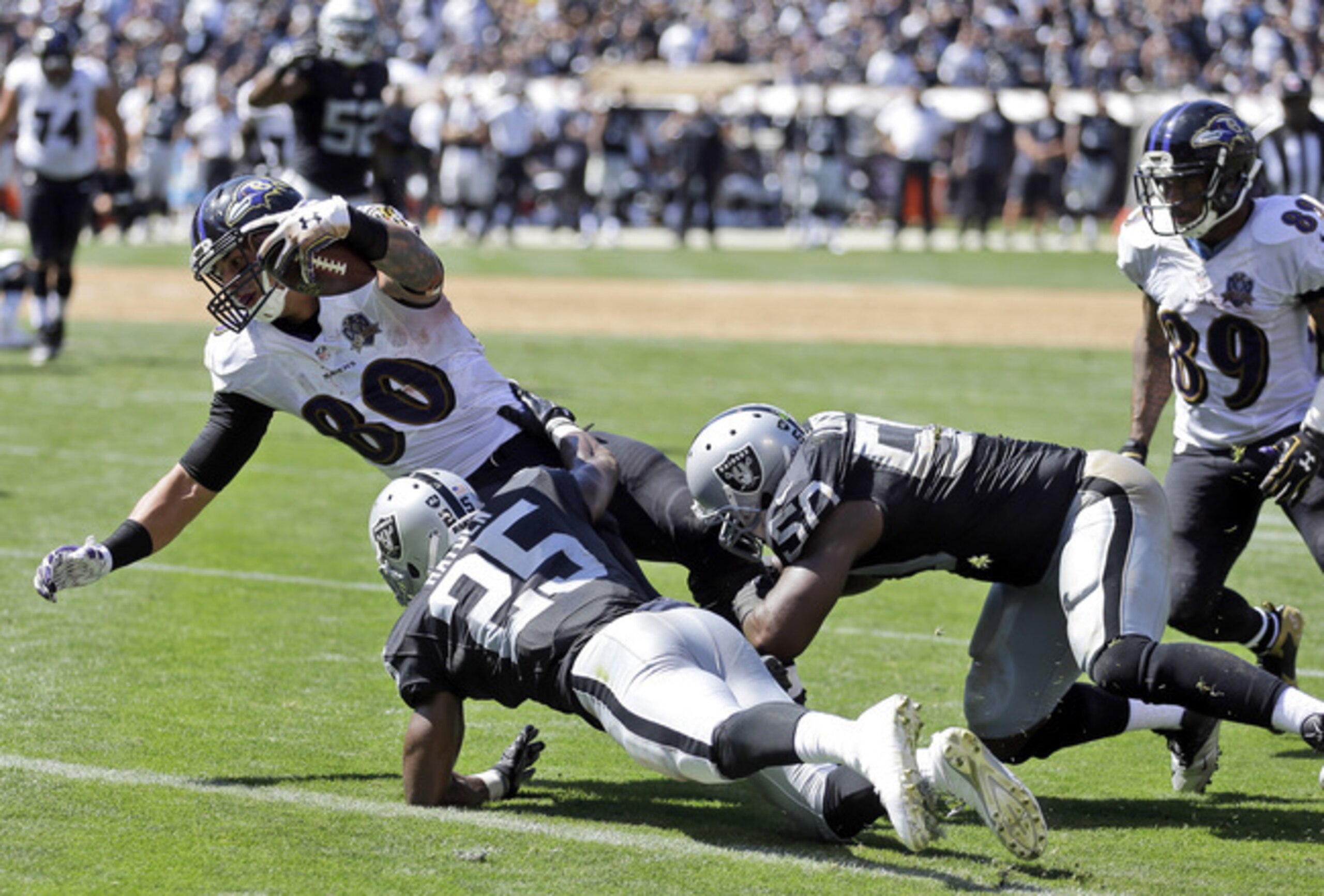 No. 80 Crockett Gillmore lunges for a touchdown.