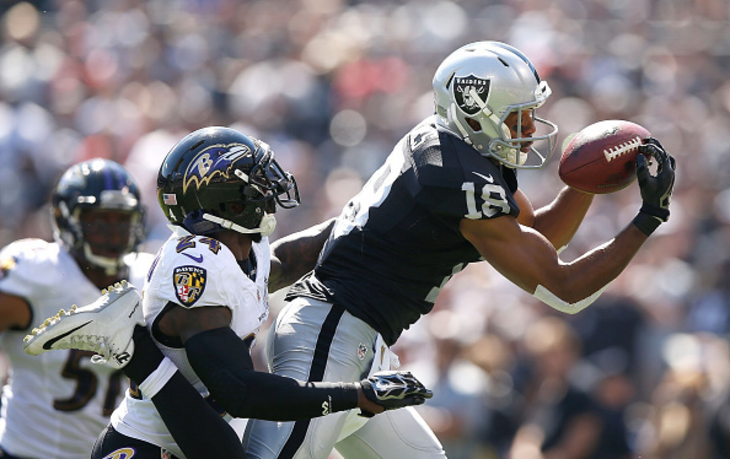 Wide receiver Andre Holmes catches a pass.