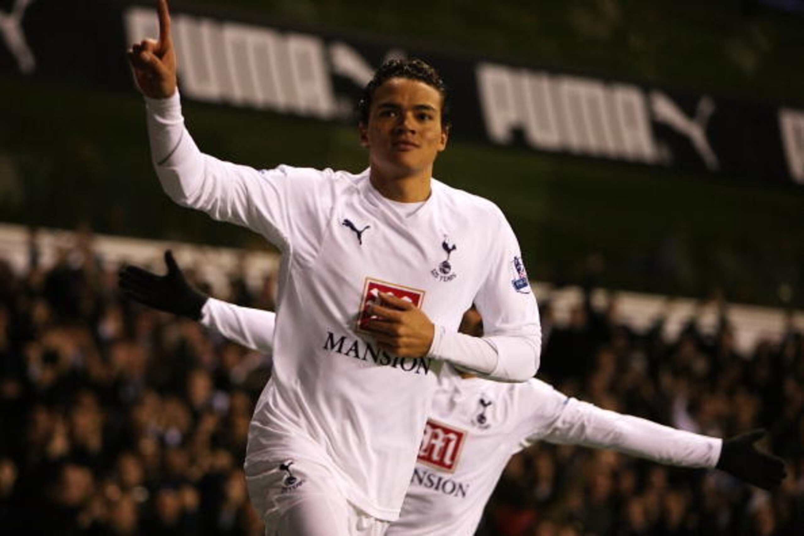 Jermaine Jenas celebrates giving Tottenham the aggregate lead in the 2008 League Cup semi-final.