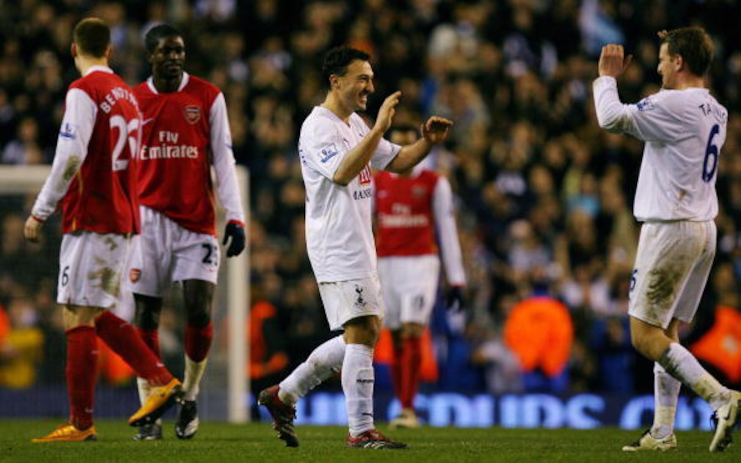 Steed Malbranque and Teemu Tainio celebrate Spurs reaching the final.