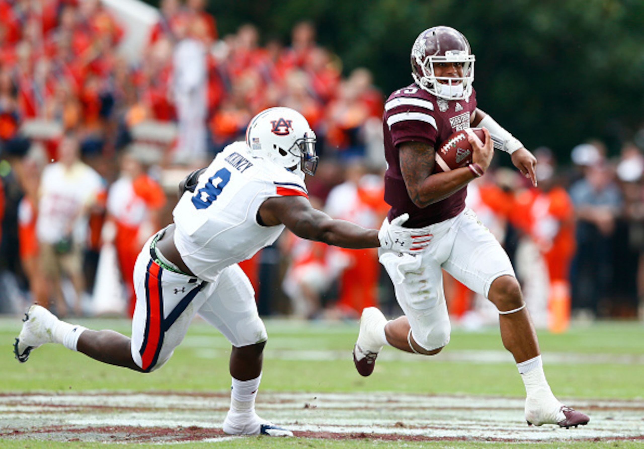 Auburn LB Cassanova McKinzy and Mississippi State QB Dak Prescott