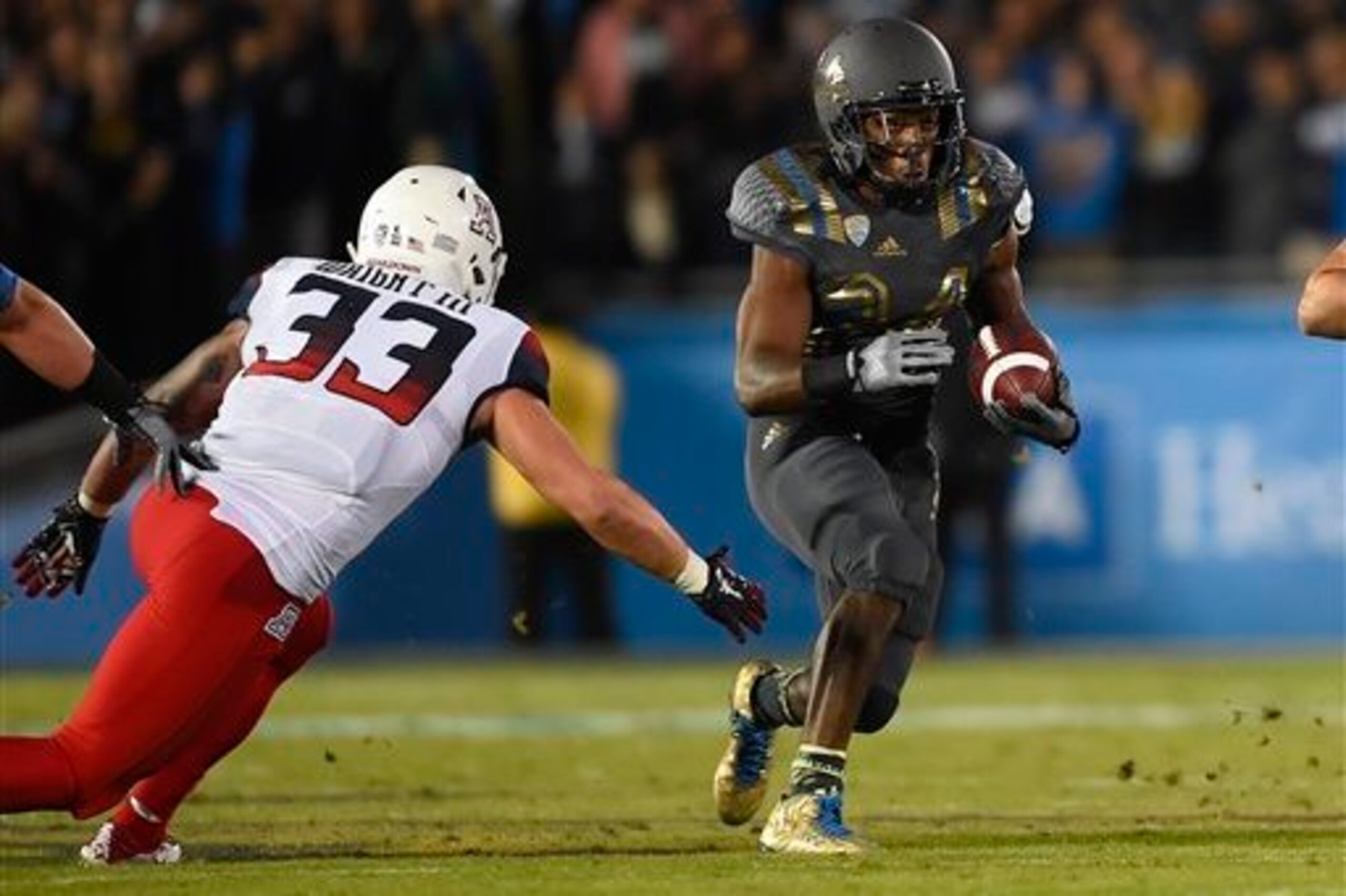Arizona LB Scooby Wright III and UCLA RB Paul Perkins