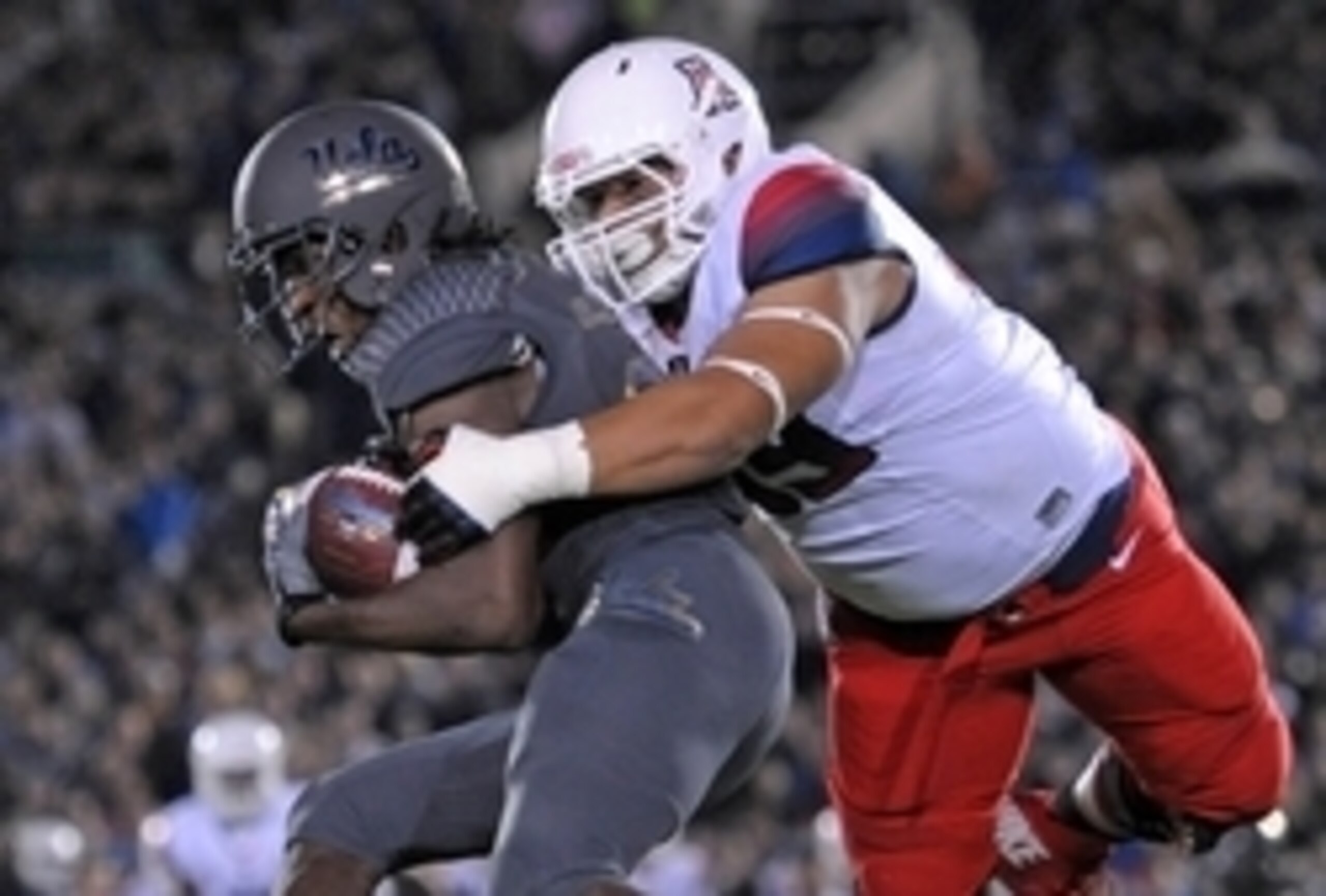 Arizona DT Sani Fuimaono (right)