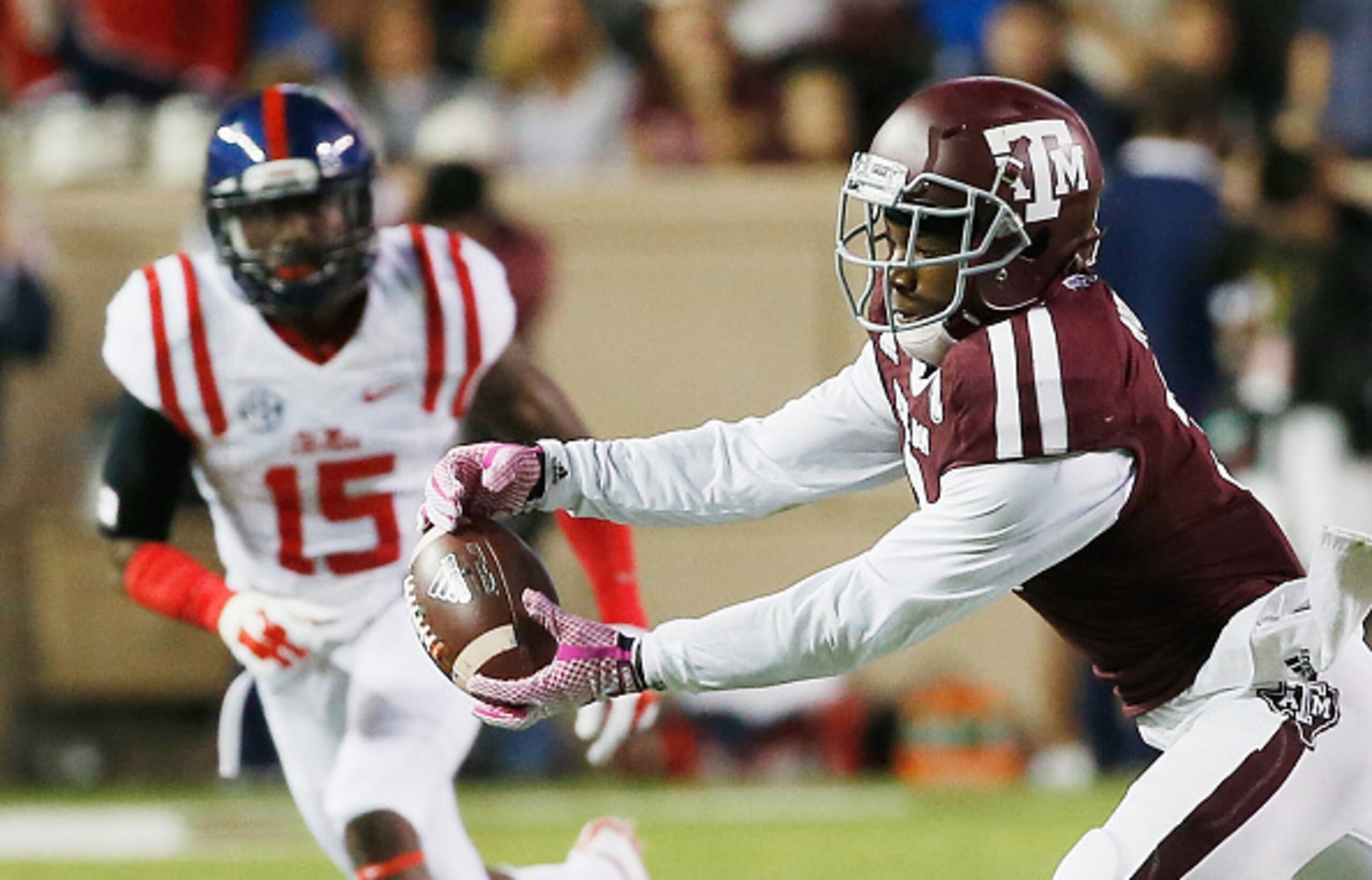 Texas A&M WR Speedy Noil (right)