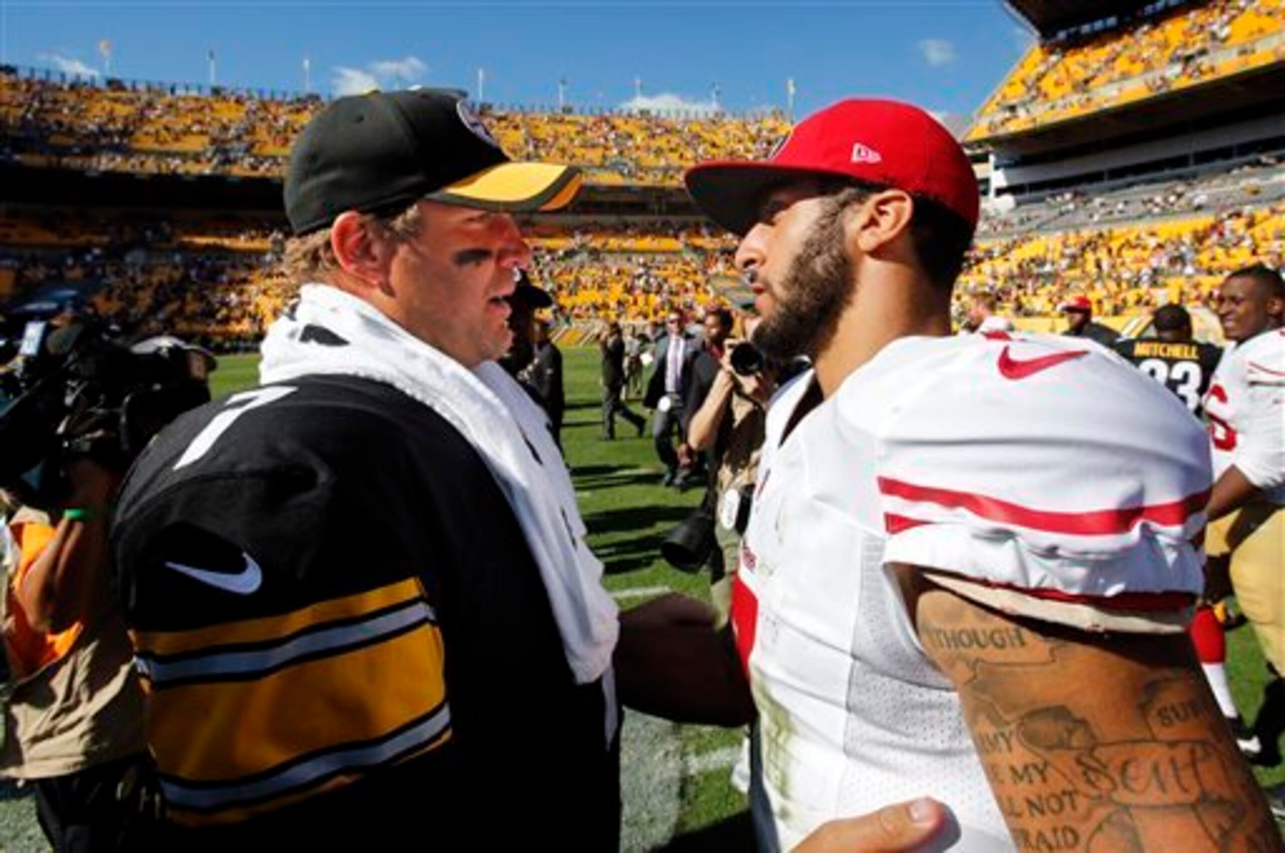 Steelers quarterback Ben Roethlisberger (left) got the better of the 49ers despite a strong effort from quarterback Colin Kaepernick (right).