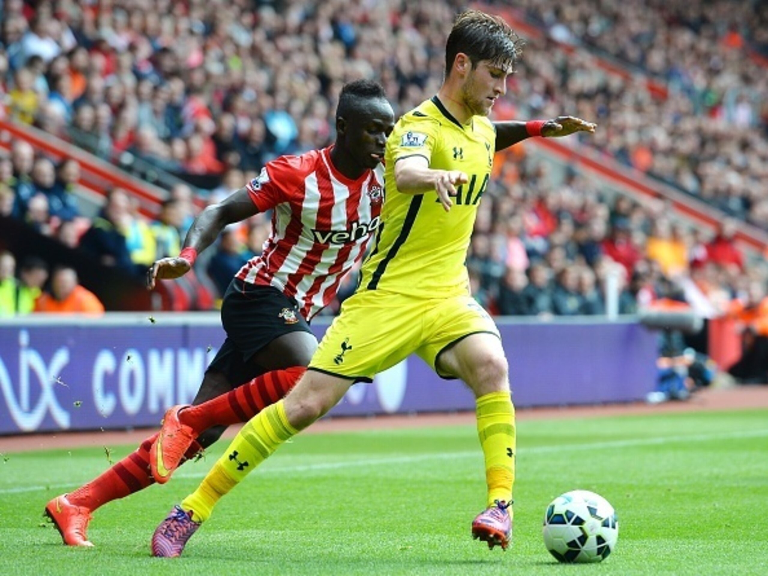 Ben Davies looking to get away from his opponent.