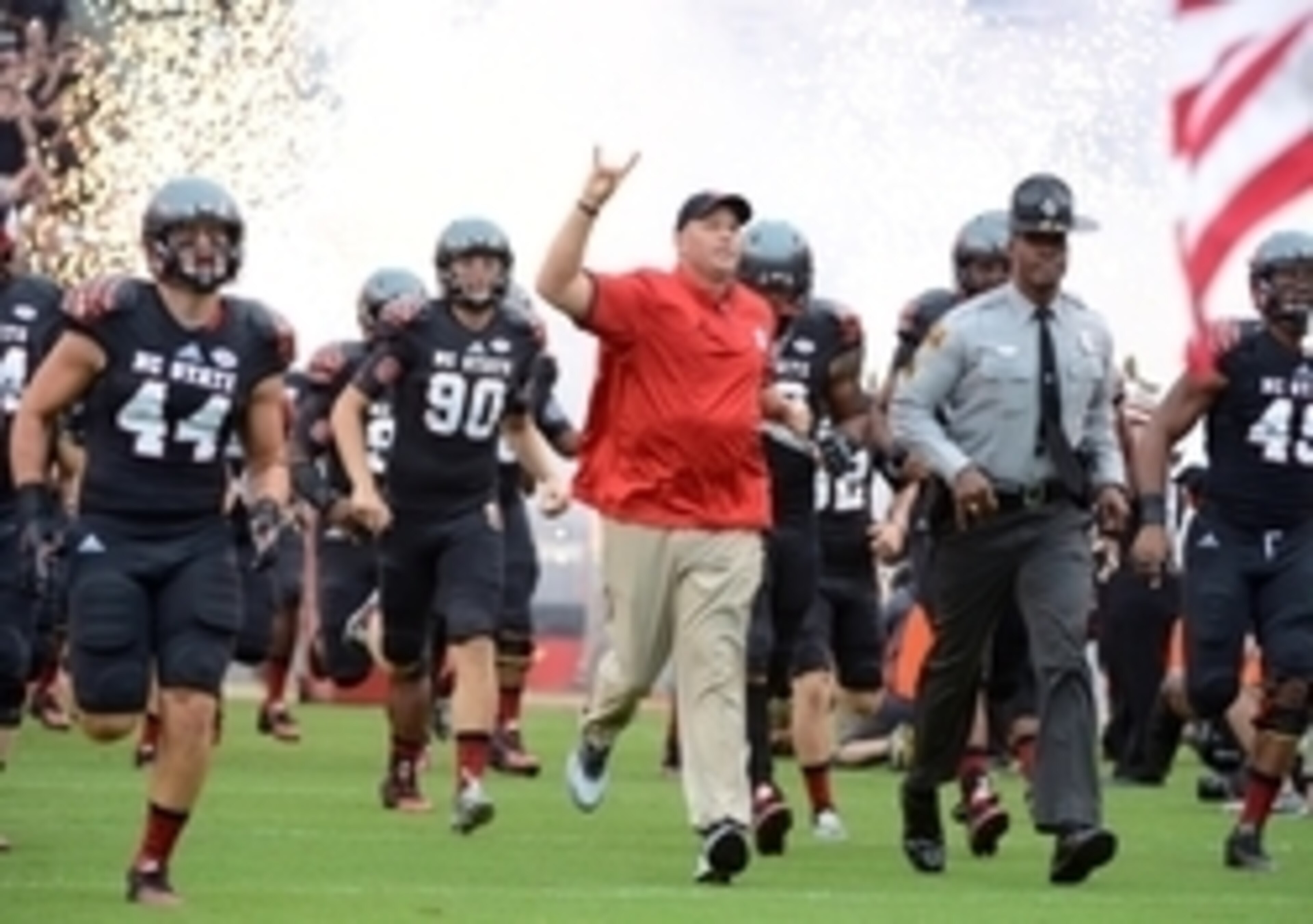 NC State HC Dave Doeren (center) NC State HC Dave Doeren (center)