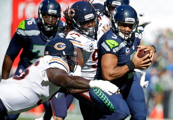 Jarvis Jenkins (left) and Pernell McPhee both recorded two sacks against Seattle.