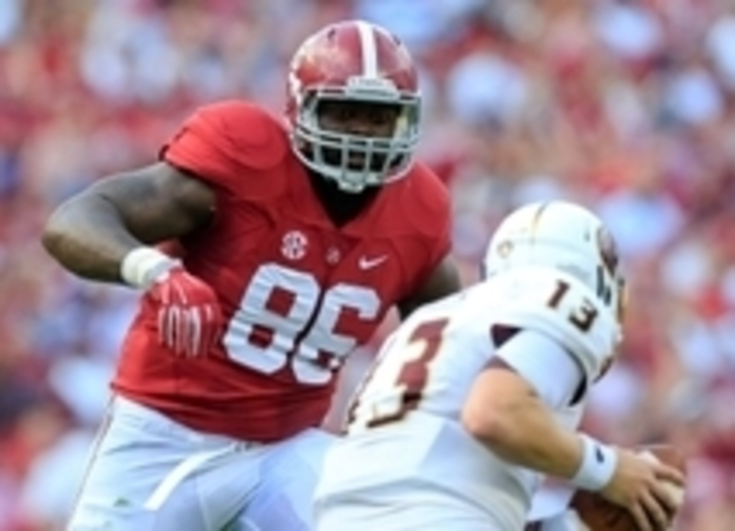 Sep 26, 2015; Tuscaloosa, AL, USA; Alabama Crimson Tide defensive lineman A'Shawn Robinson (86) chases after Louisiana Monroe Warhawks quarterback Garrett Smith (13) at Bryant-Denny Stadium. Mandatory Credit: Marvin Gentry-USA TODAY Sports