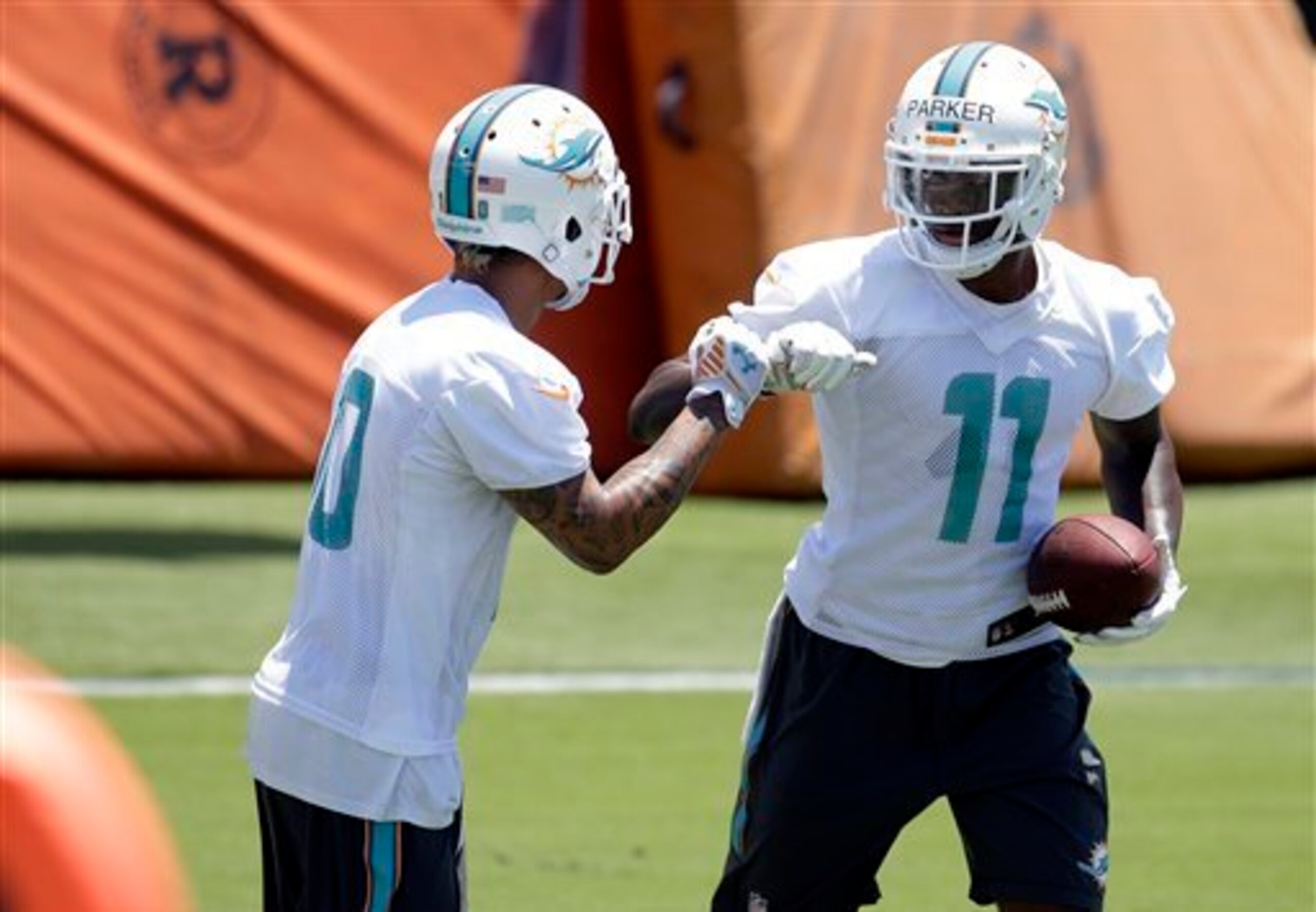 Wide receivers Kenny Stills (left) and DeVante Parker (right) have not lived up to the hype since joining the Miami Dolphins.