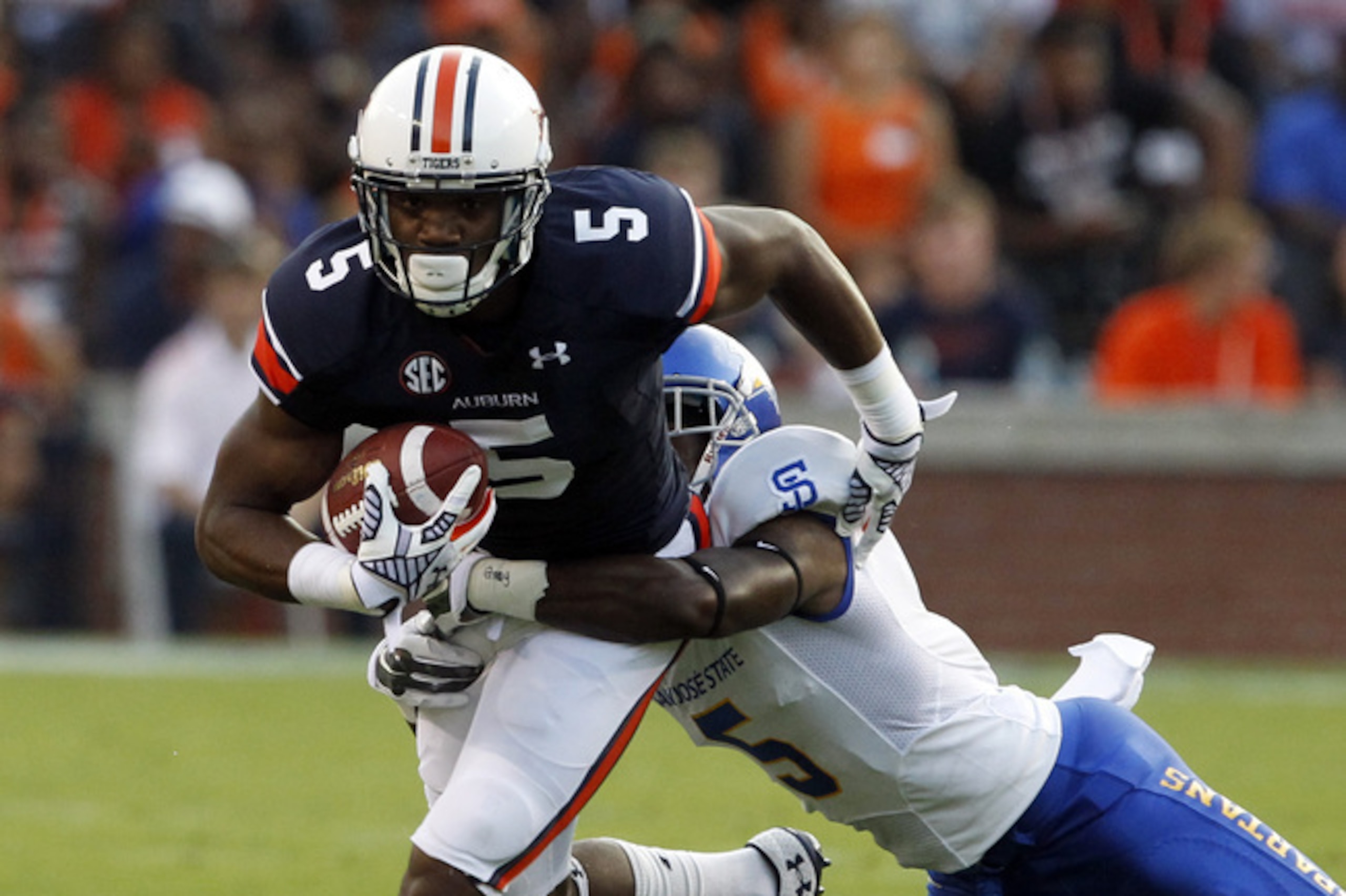 Auburn WR Ricardo Louis (left) vs. San Jose State in 2014.