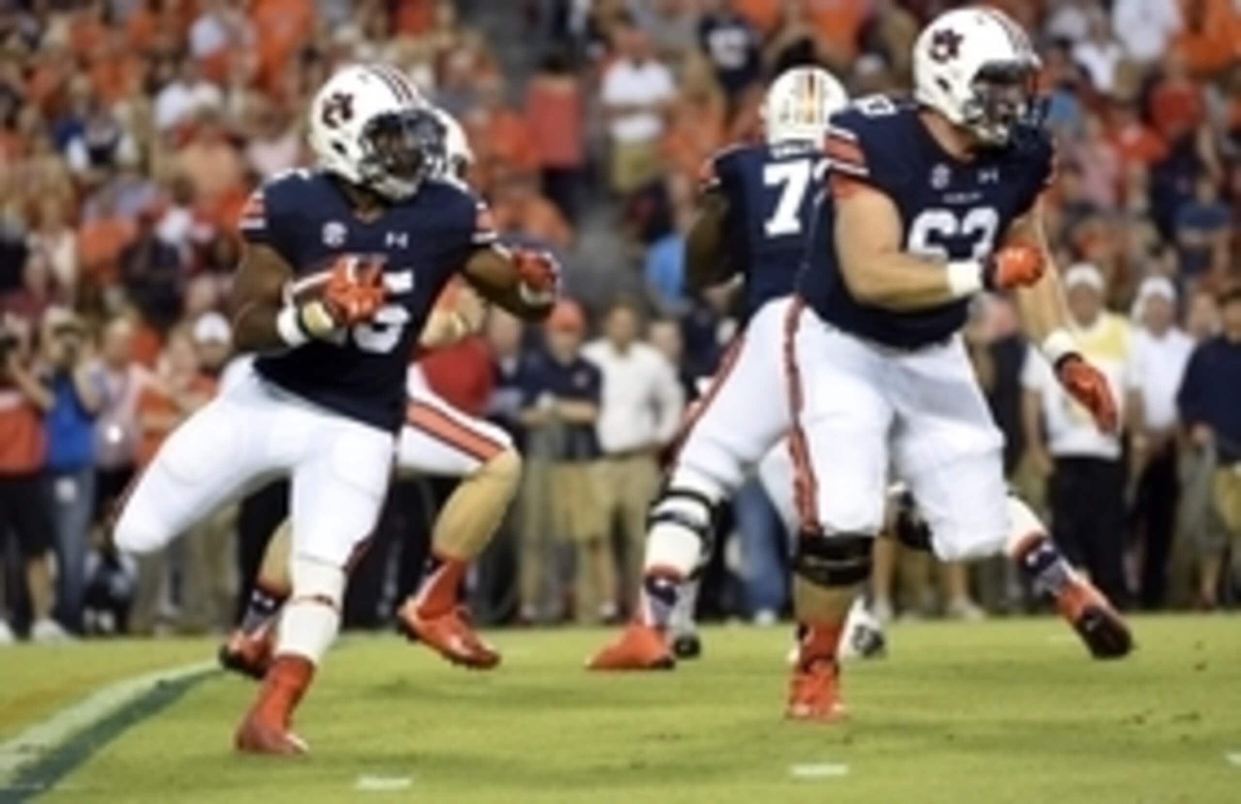 Auburn RB Peyton Barber (left).