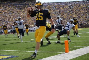 The important part of the picture might seem like Jake Rudock scoring a touchdown, but the surprise is somewhere else.