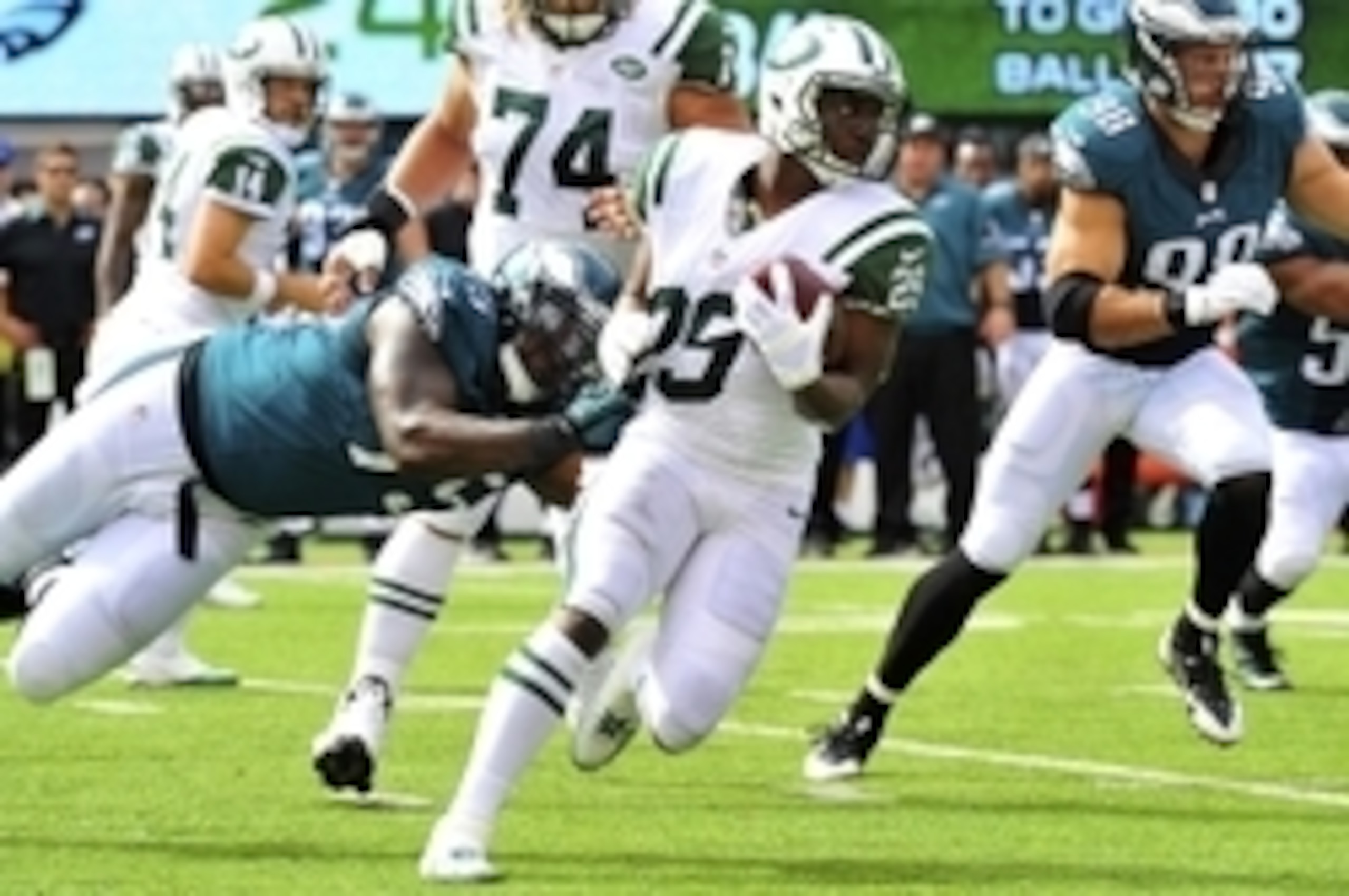Bilal Powell fights for extra yards against the Eagles.