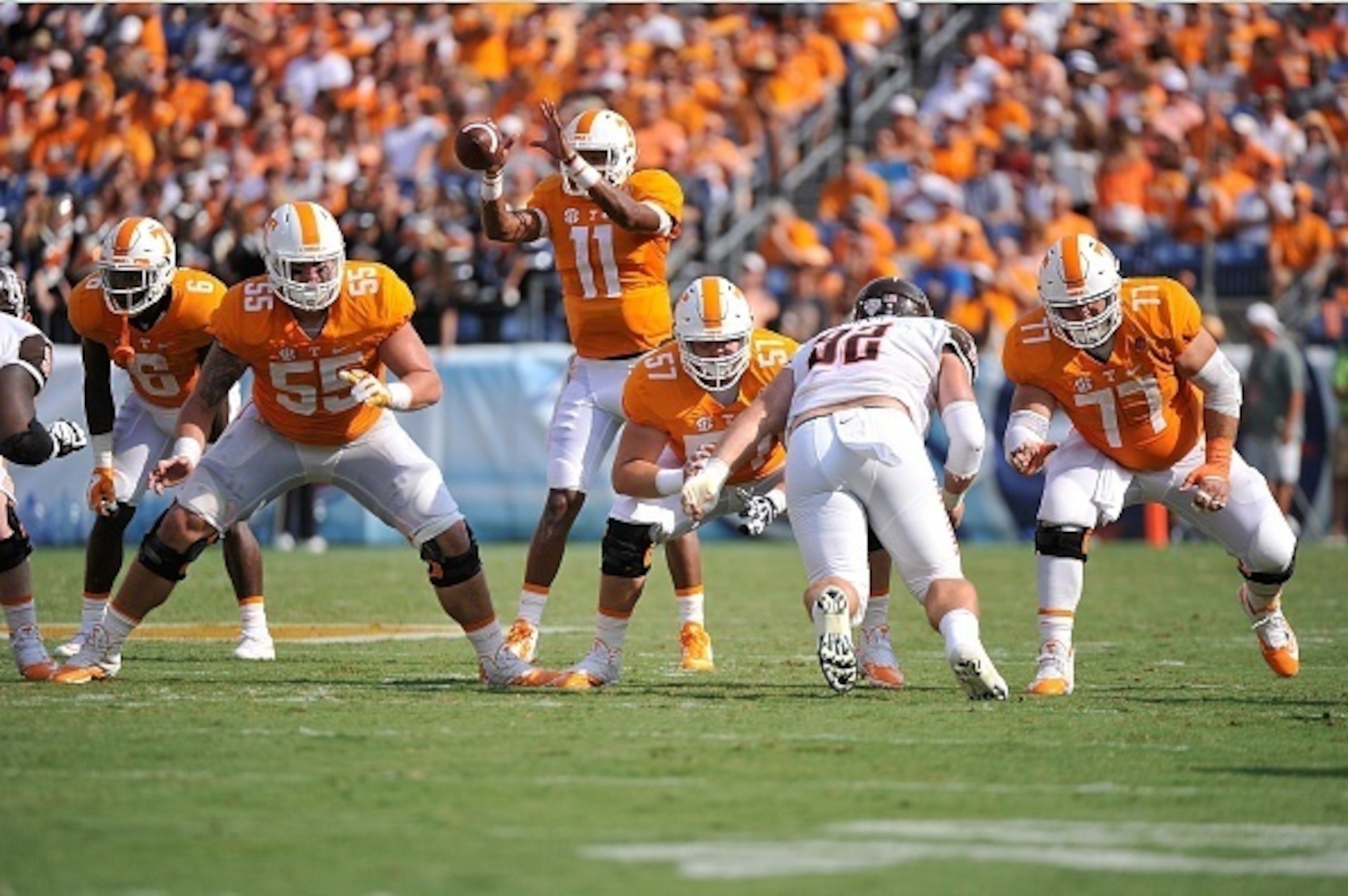 NASHVILLE, TN - SEPTEMBER 05:  Coleman Thomas #55, Mack Crowder #57, and Kyler Kerbyson #77 of the Tennessee Volunteers block against the Bowling Green Falcons at Nissan Stadium on September 5, 2015 in Nashville, Tennessee.  (Photo by Frederick Breedon/Ge