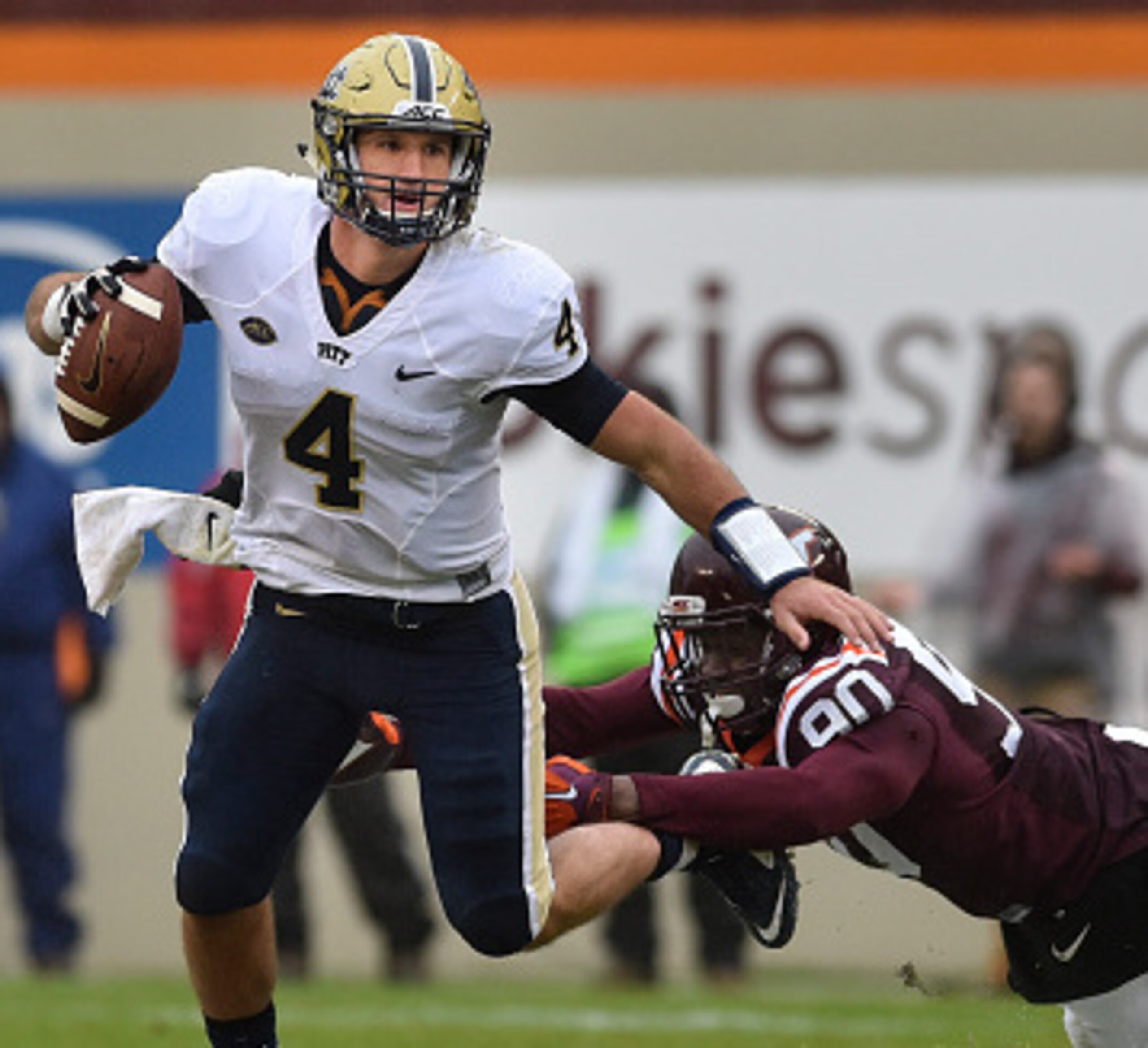 Defensive end Dadi Nicolas puts the heat on Pitt QB Nate Peterman.