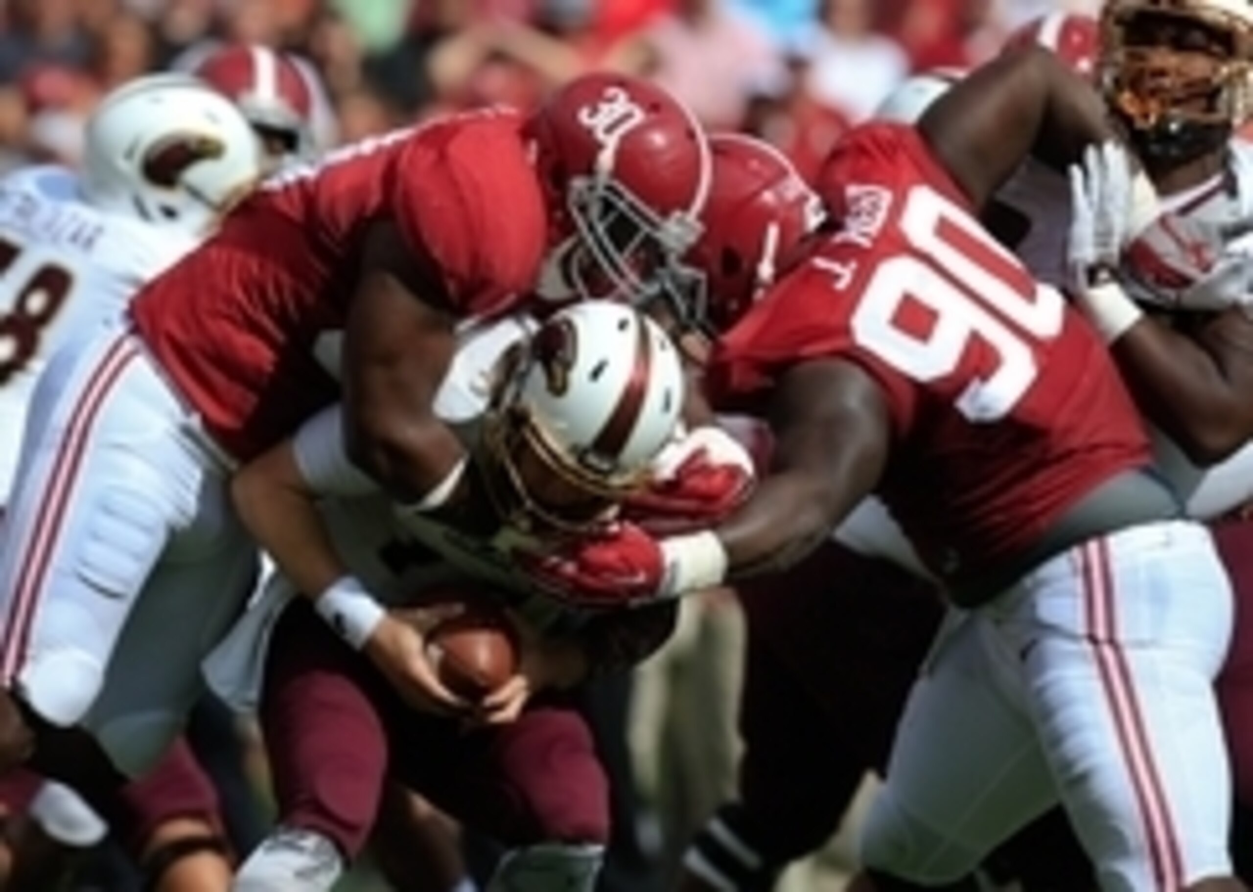Sep 26, 2015; Tuscaloosa, AL, USA; Alabama Crimson Tide linebacker Denzel Devall (30) and defensive lineman Jarran Reed (90) tackle Louisiana Monroe Warhawks quarterback Garrett Smith (13) at Bryant-Denny Stadium. Mandatory Credit: Marvin Gentry-USA TODAY