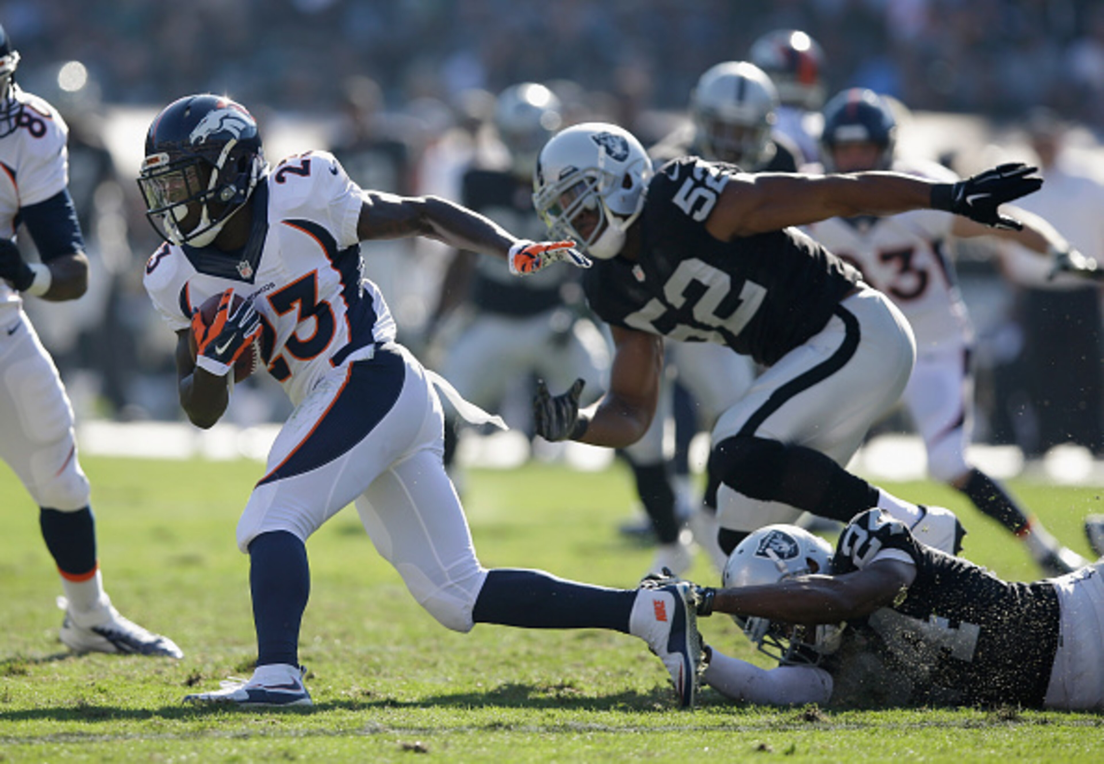 Lineback Khalil Mack chases running back Ronnie Hillman.
