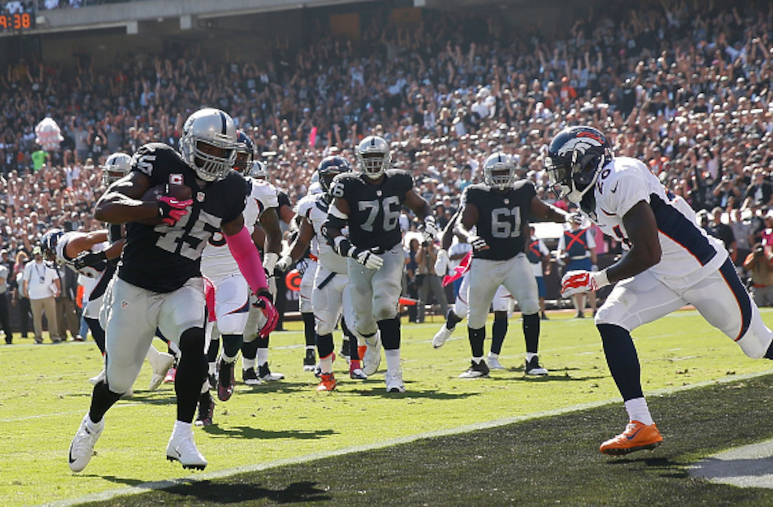 No. 45 Marcel Reece scores a touchdown