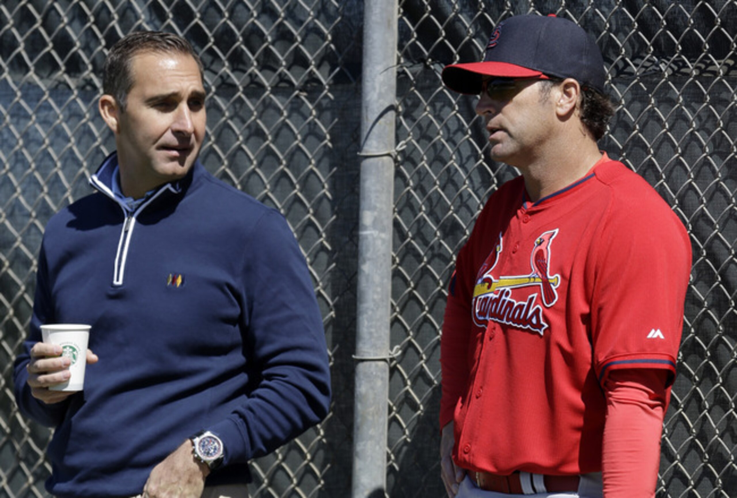 John Mozeliak (left) and Mike Matheny