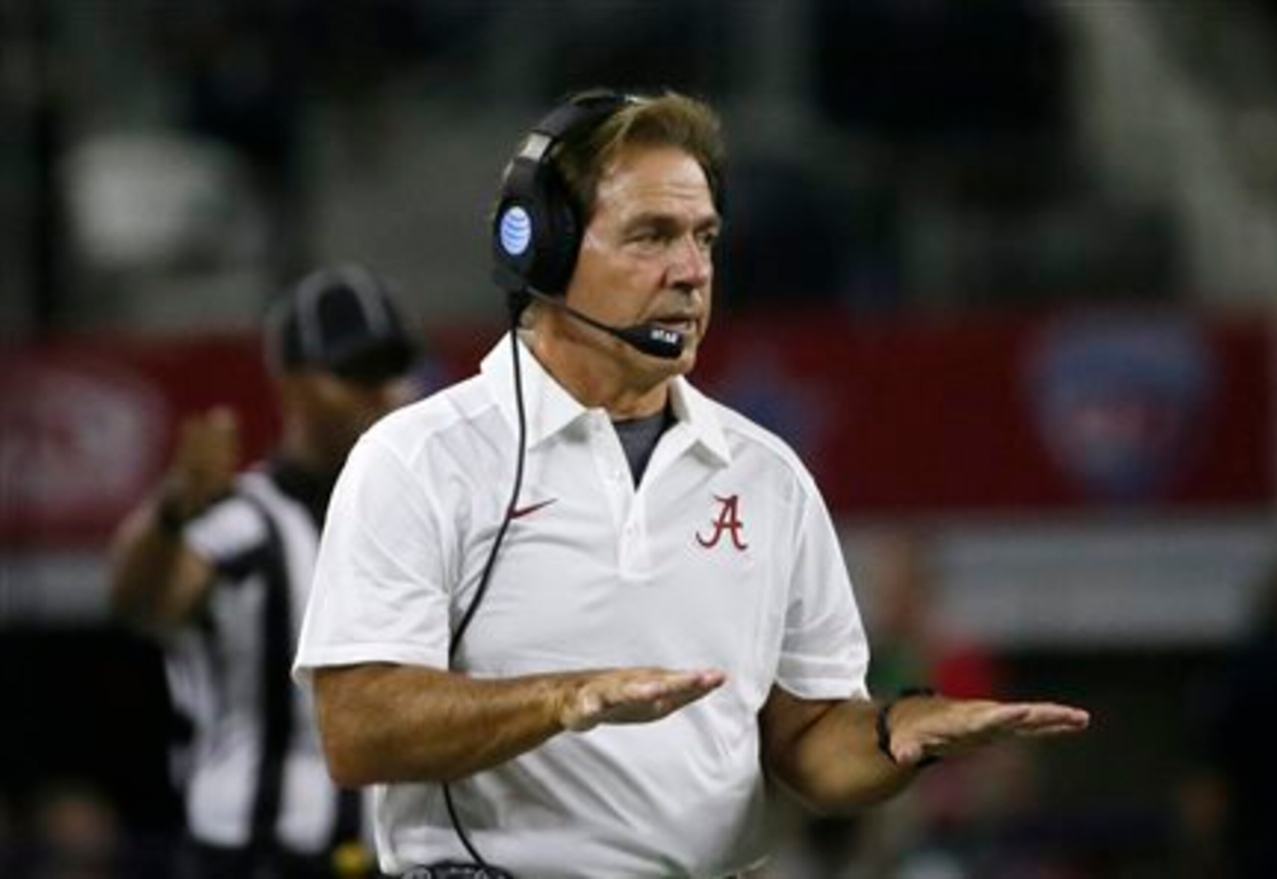 Alabama head coach Nick Saban gives directions from the sidelines during the first half of an NCAA college football game against Wisconsin, Saturday, Sept. 5, 2015, in Arlington, Texas. (AP Photo/LM Otero)