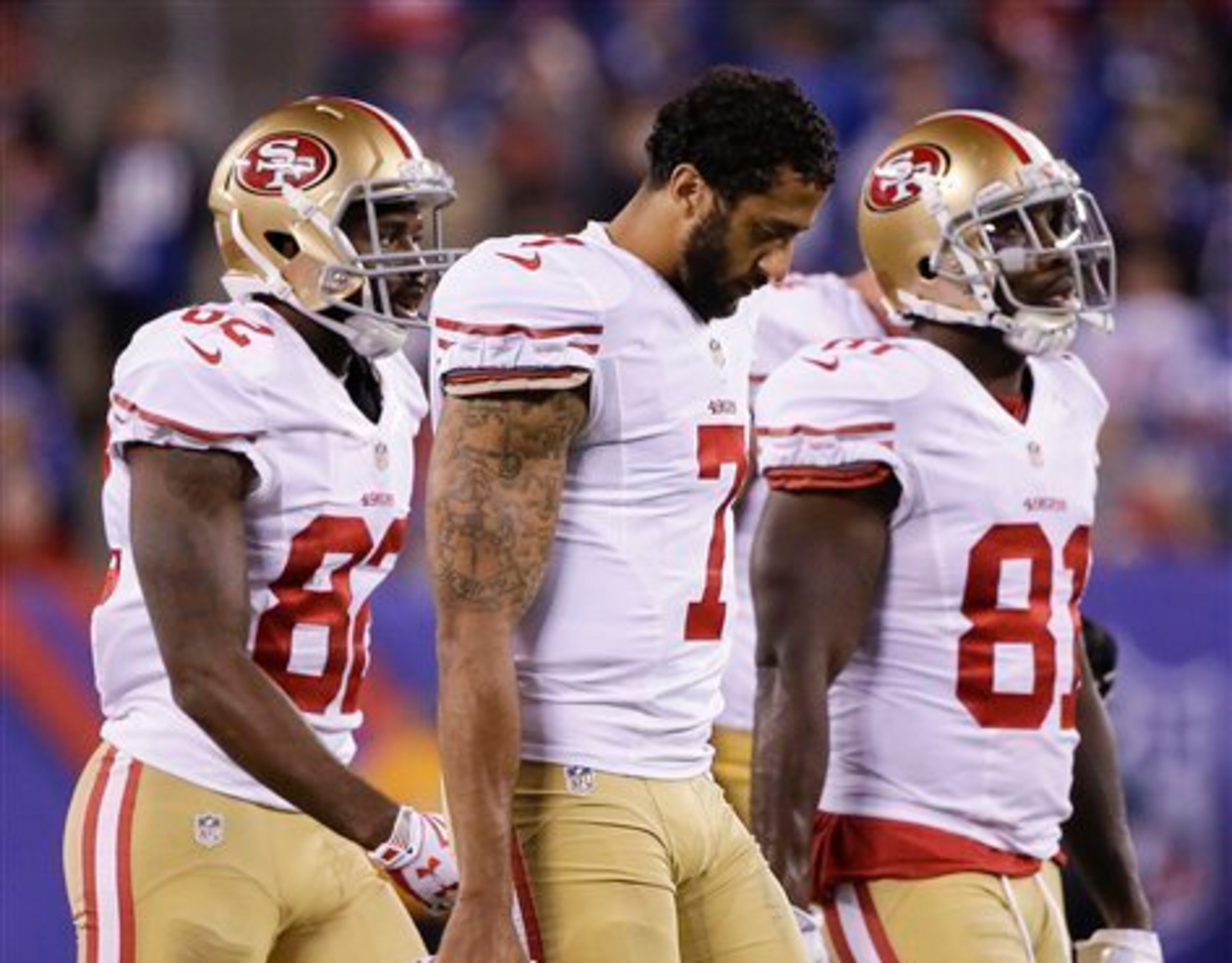 Can quarterback Colin Kaepernick (center) find some connections with wideouts Torrey Smith (left) and Anquan Boldin (right)?