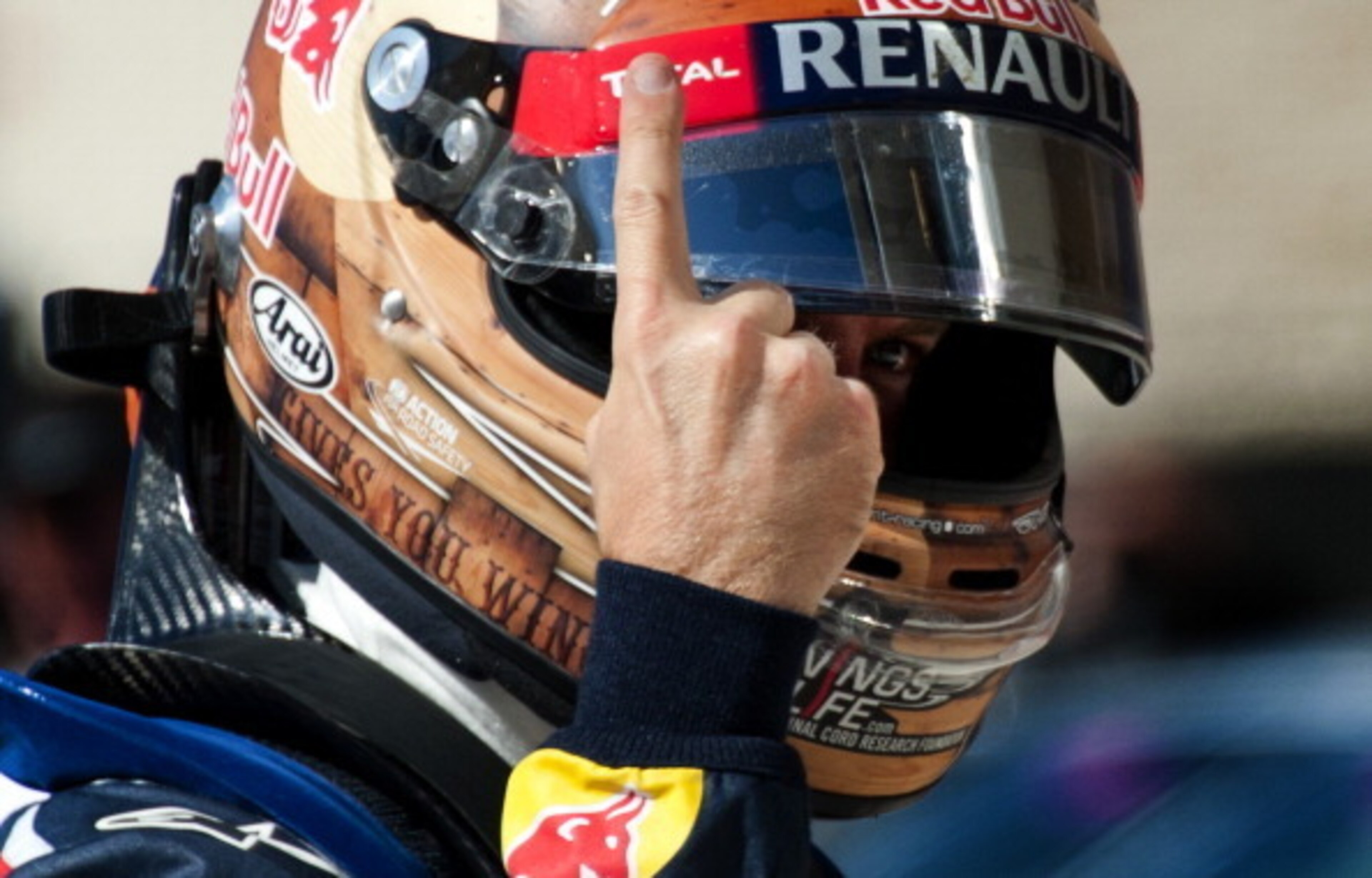 Sebastian Vettel raises the famous finger.