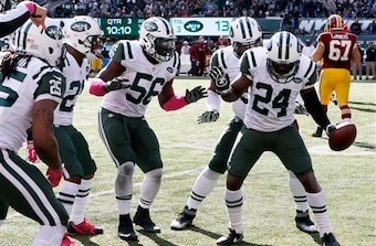 Darrelle Revis celebrates an interception.