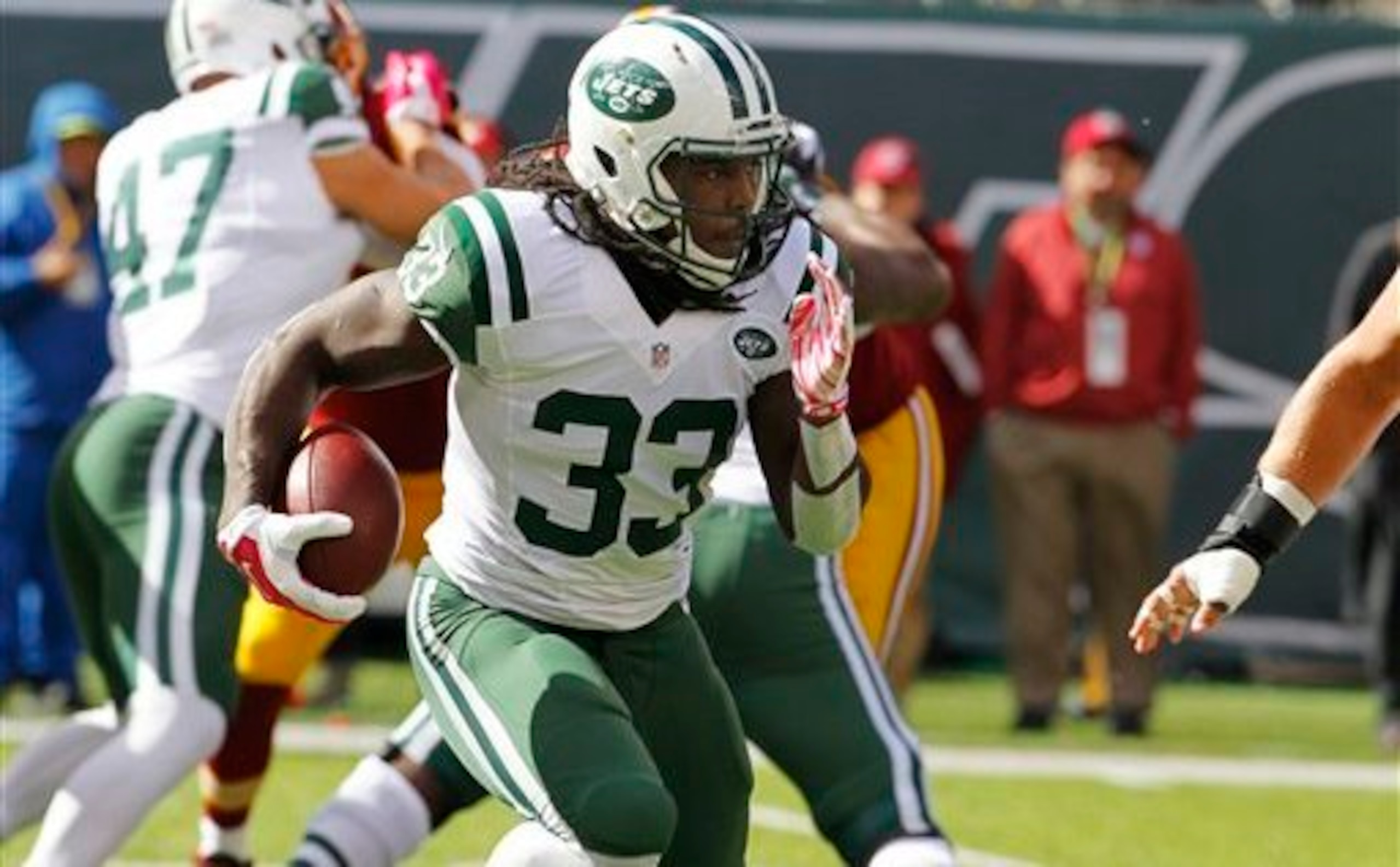 Chris Ivory looks for a lane against the Redskins. Chris Ivory looks for a lane against the Redskins.