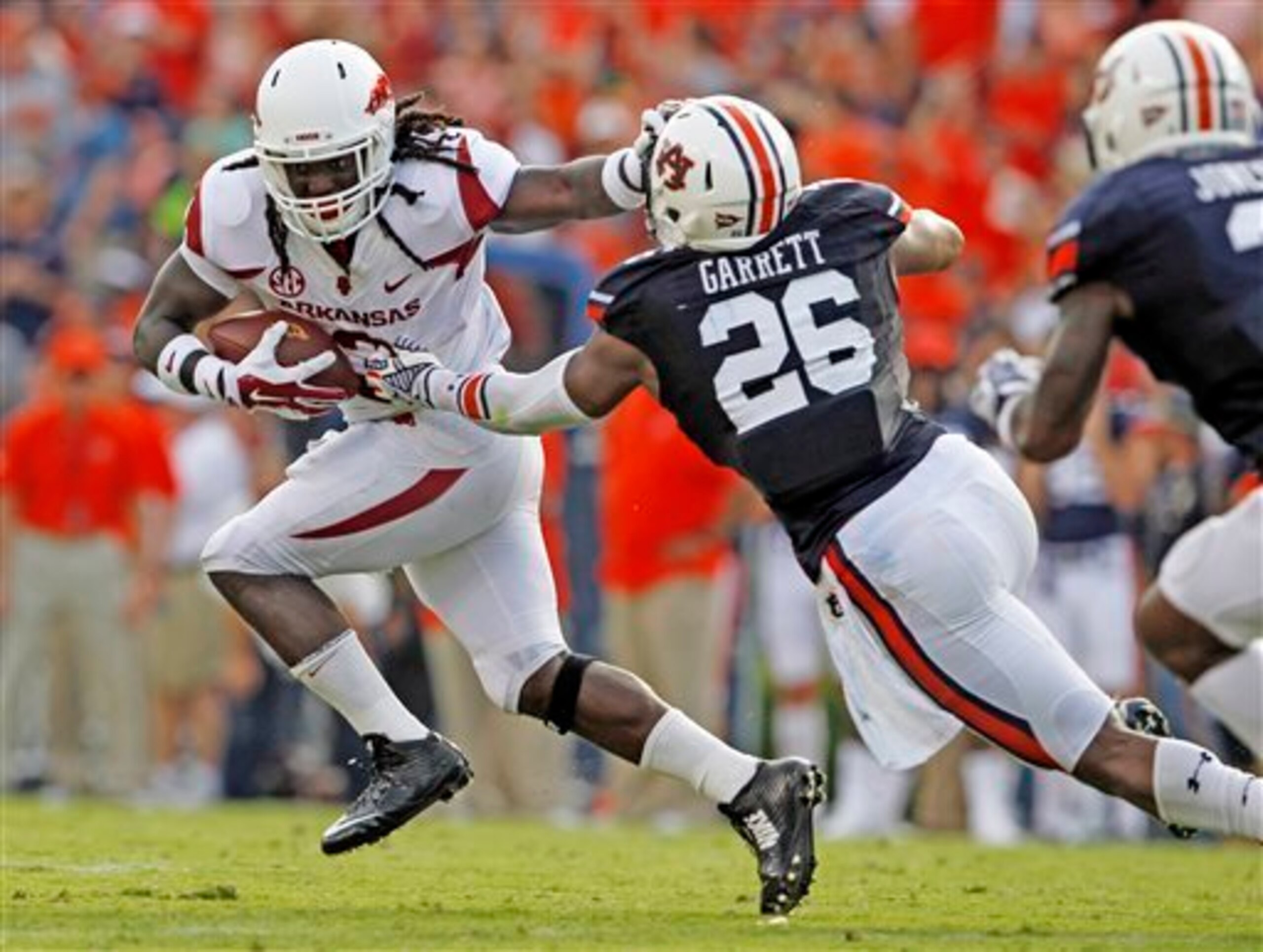 Arkansas RB Alex Collins and Auburn LB Justin Garrett