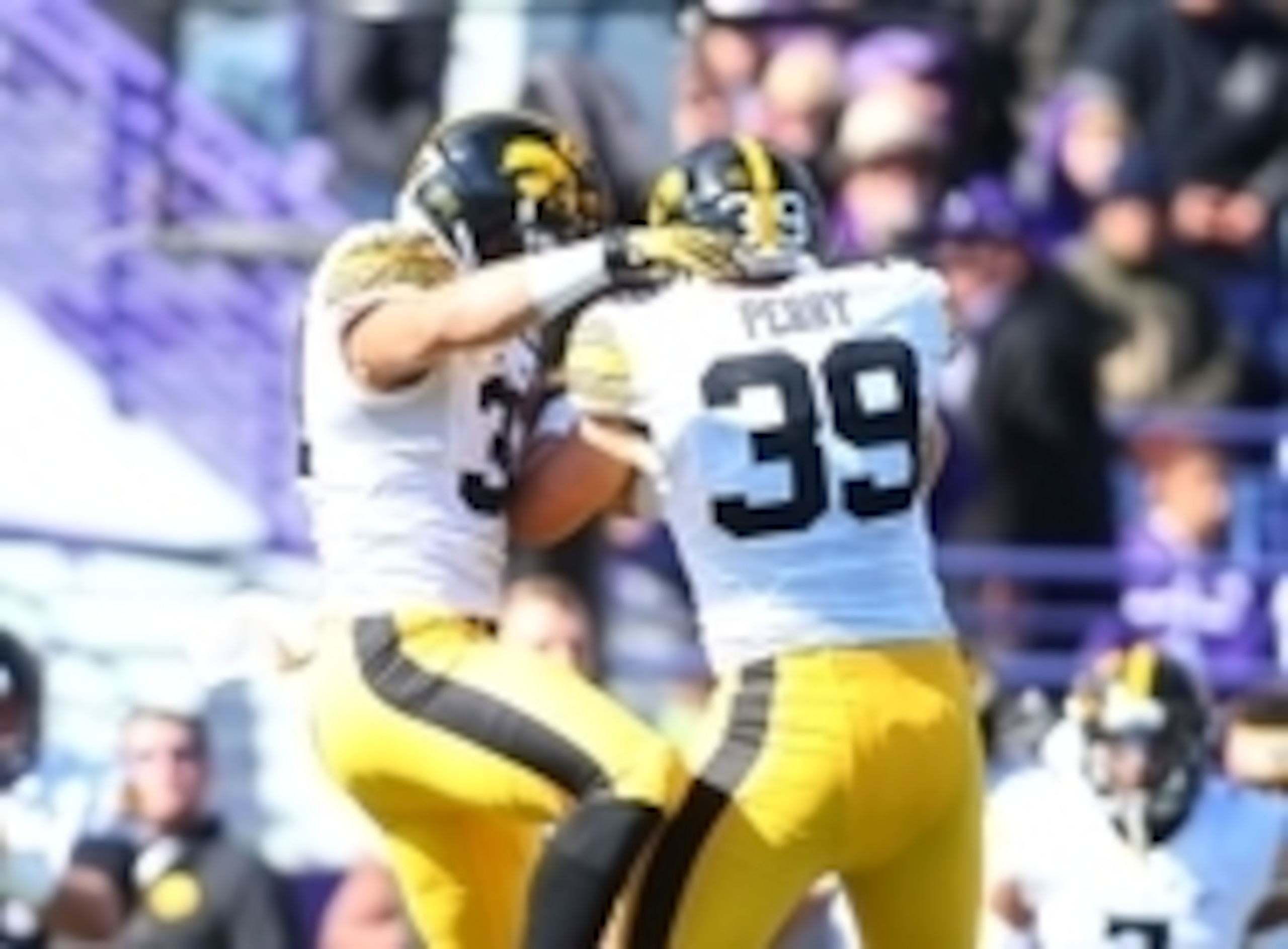 Iowa DE Nate Meier and LB Travis Perry Iowa DE Nate Meier and LB Travis Perry