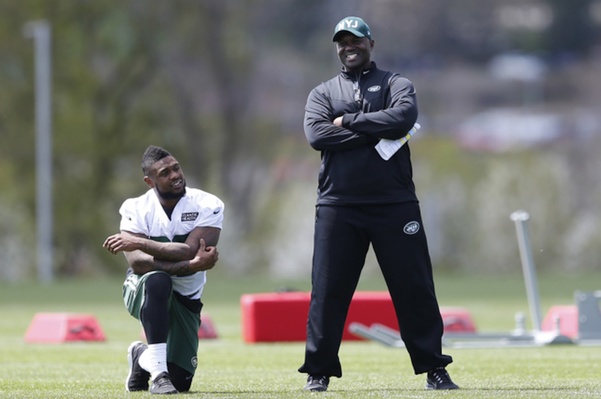 Stevan Ridley talks to Jets coach Todd Bowles. Stevan Ridley talks to Jets coach Todd Bowles.