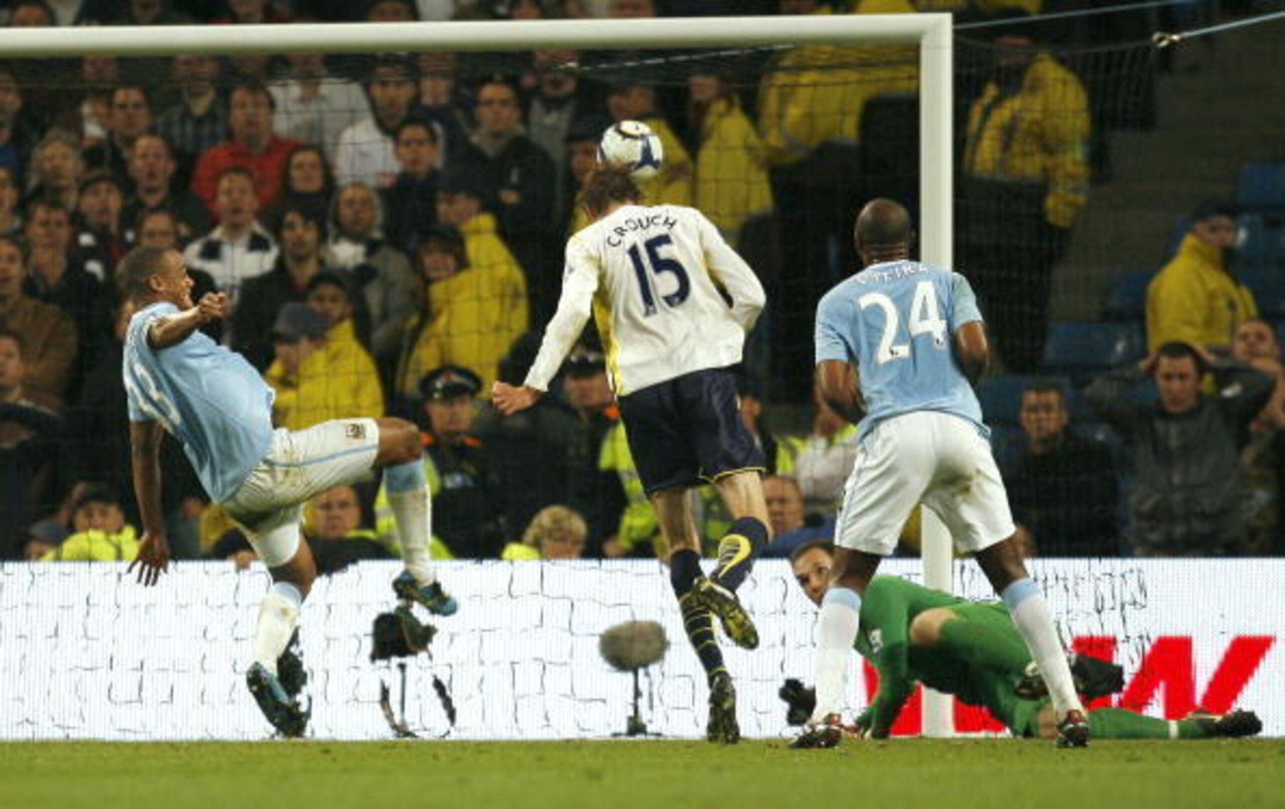 Peter Crouch heads Tottenham into the Champions League.