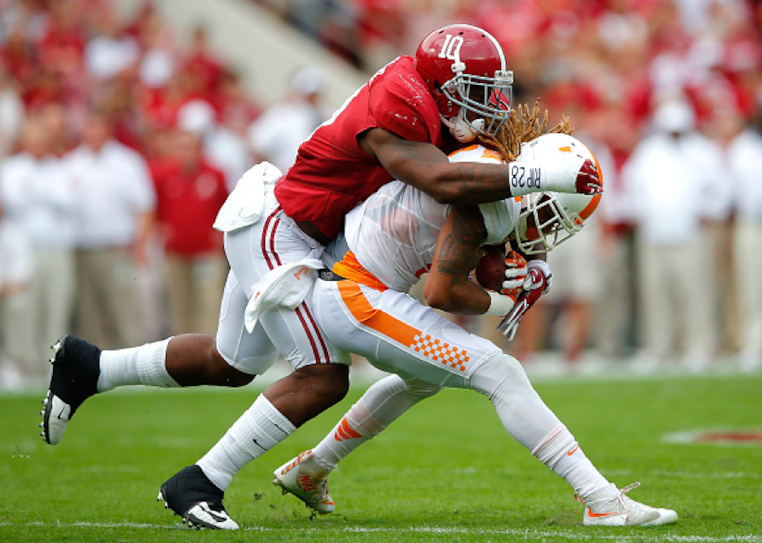 Alabama LB Reuben Foster (left)