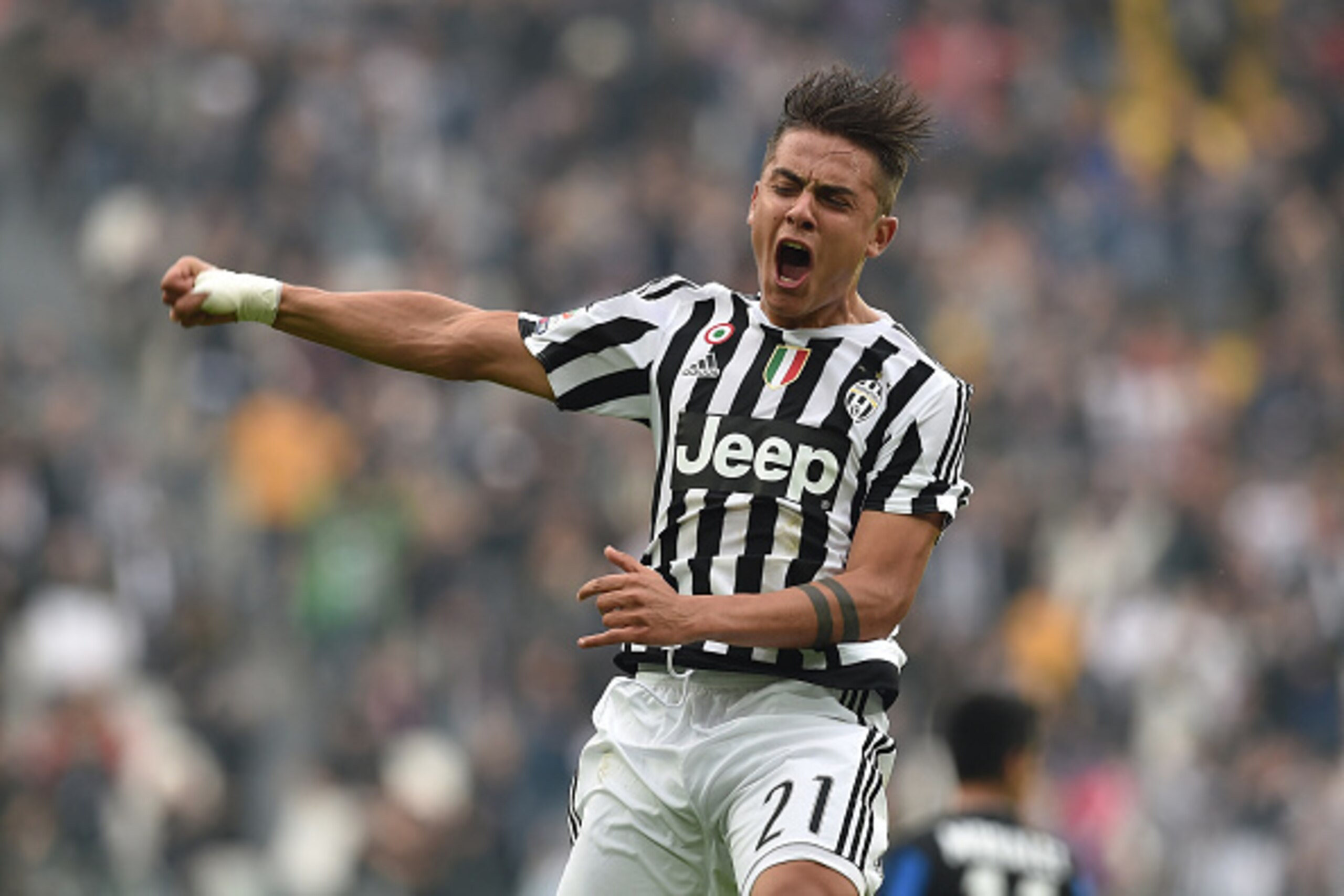 Dybala celebrates his first-half screamer.