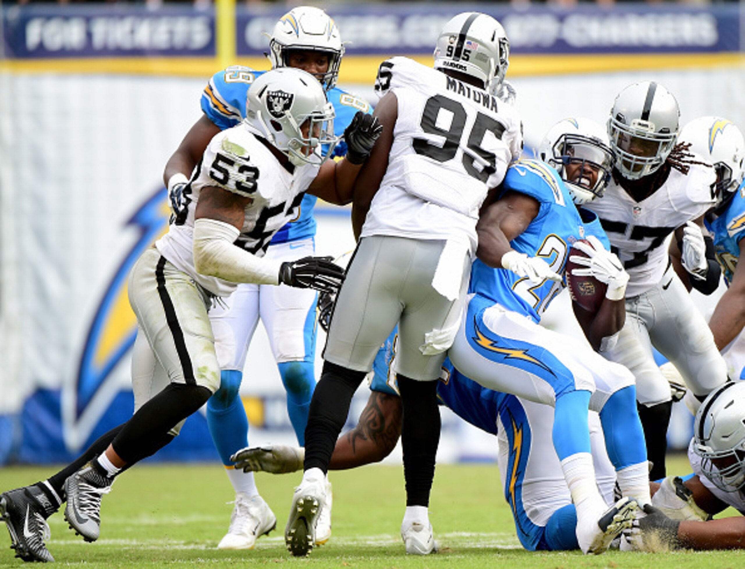 Raiders defense stopping the Chargers ground attack