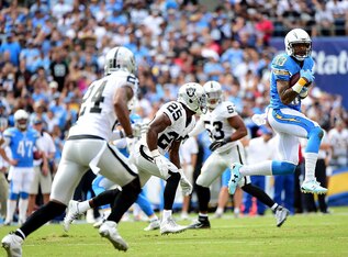 Keenan Allen making a catch against the Raiders defense