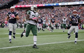 Chris Ivory scores a touchdown against the Patriots
