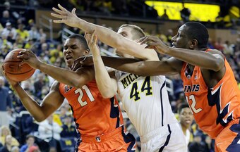 Illinois' Malcolm Hill (left)