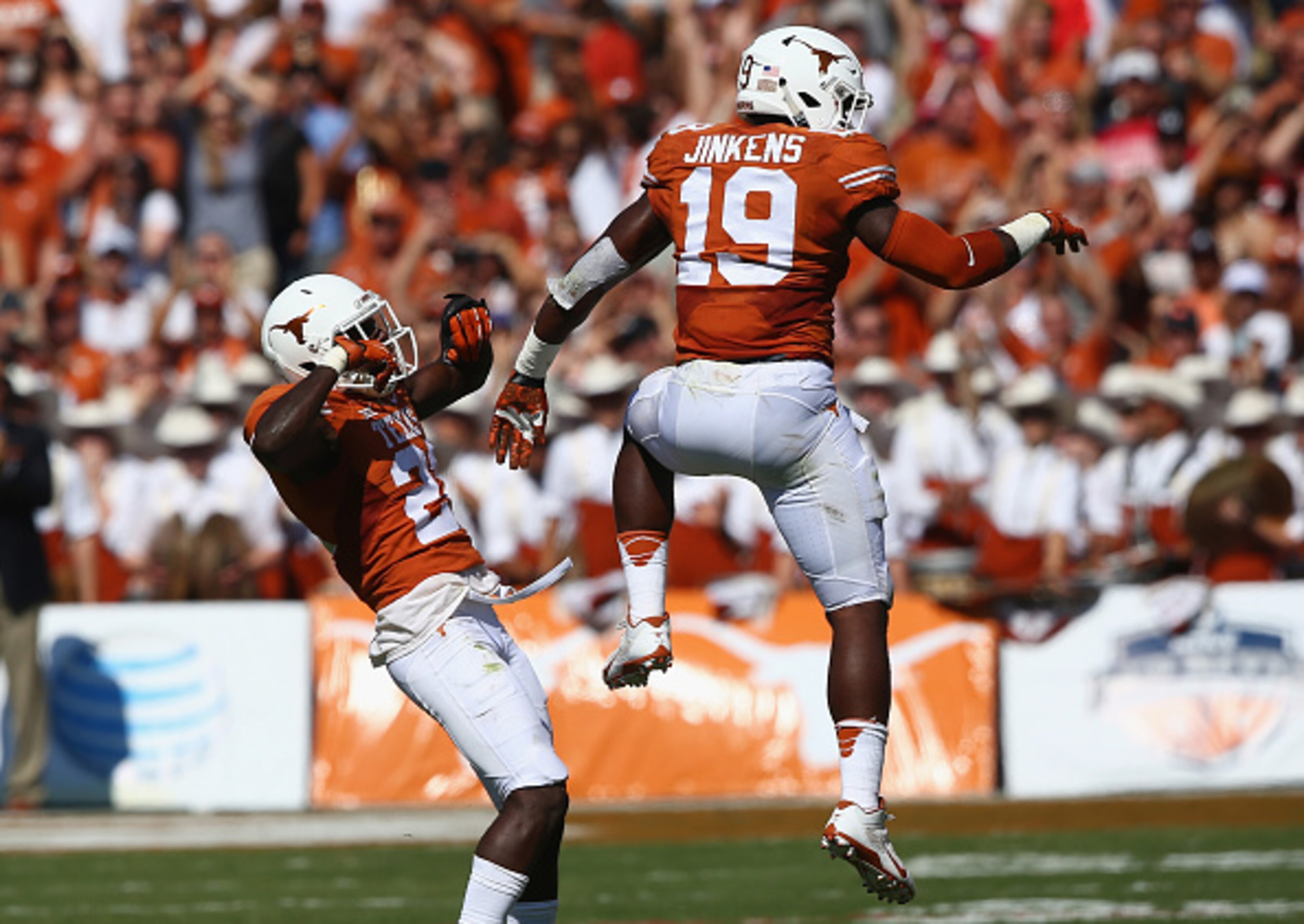 Jinkens (right) is having a career year for the Longhorns at linebacker.