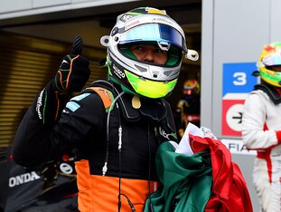 Sergio Perez celebrates his third-place finish in Russia.
