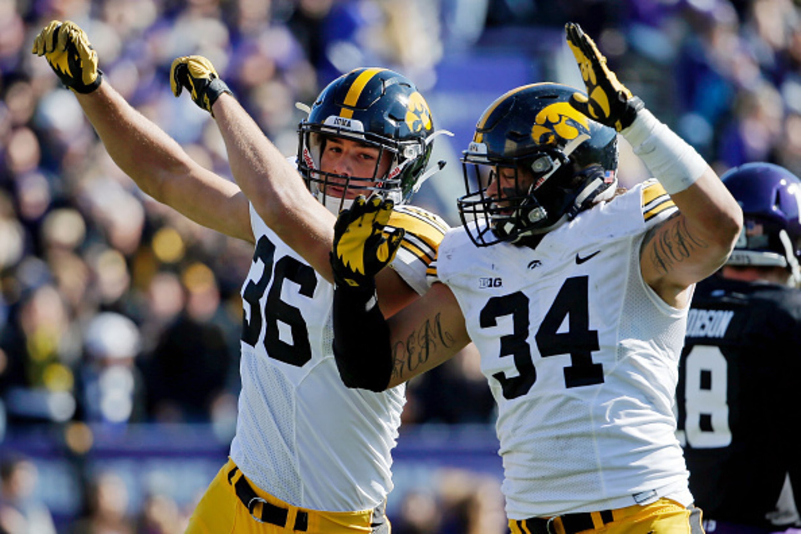 Iowa LB Cole Fisher and DE Nate Meier