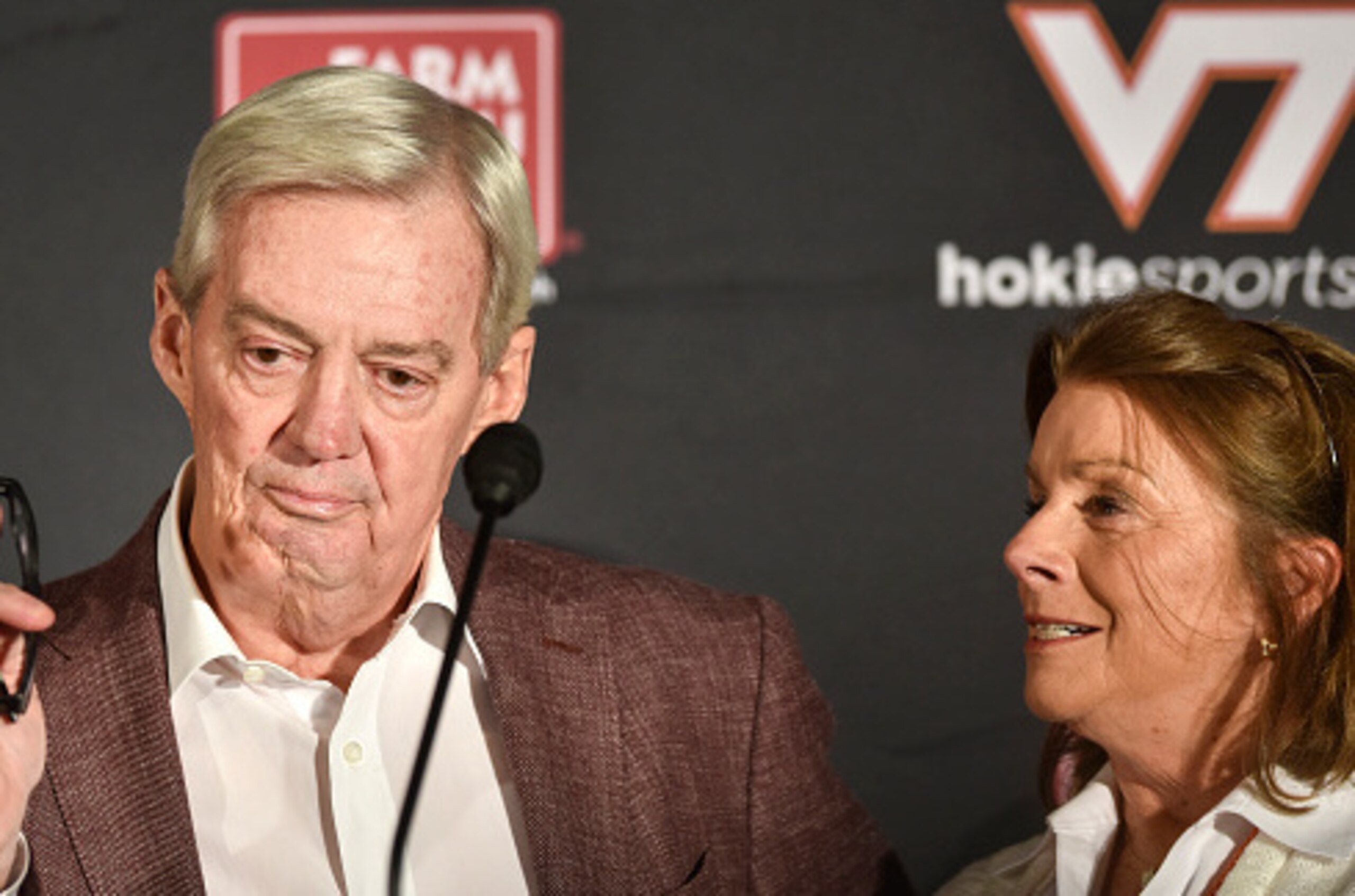 Beamer and wife Cheryl discussing his retirement