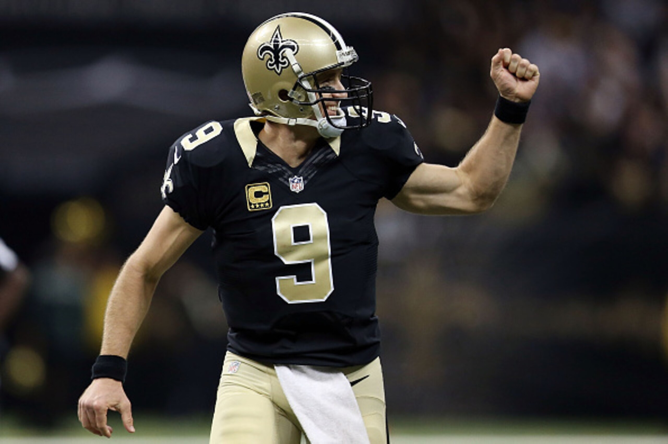 NEW ORLEANS, LA - NOVEMBER 01: Drew Brees #9 of the New Orleans Saints celebrates a touchdown during the second quarter of a game against the New York Giants at the Mercedes-Benz Superdome on November 1, 2015 in New Orleans, Louisiana. (Photo by Chris G NEW ORLEANS, LA - NOVEMBER 01: Drew Brees #9 of the New Orleans Saints celebrates a touchdown during the second quarter of a game against the New York Giants at the Mercedes-Benz Superdome on November 1, 2015 in New Orleans, Louisiana. (Photo by Chris G