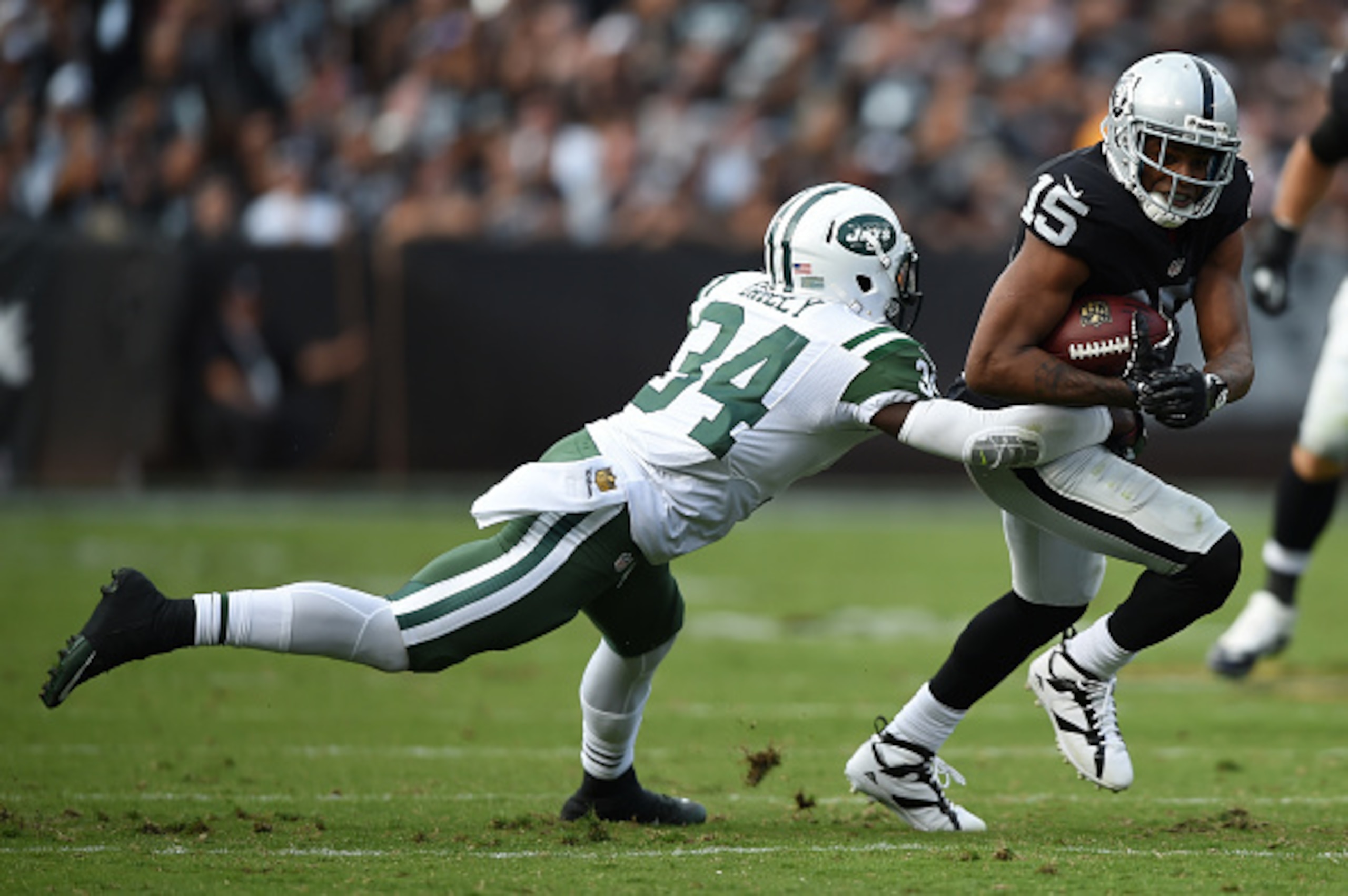 Raiders wide receiver Michael Crabtree makes a catch. Raiders wide receiver Michael Crabtree makes a catch.