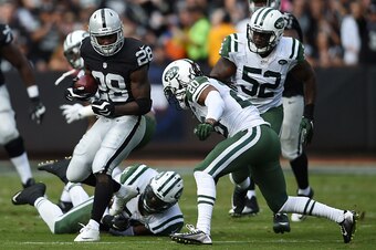 Raiders running back Latavius Murray takes a carry.