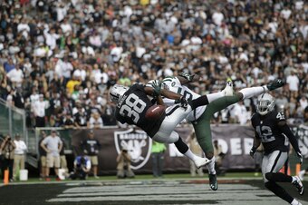 Brandon Marshall goes up but doesn't come down with an end-zone grab.