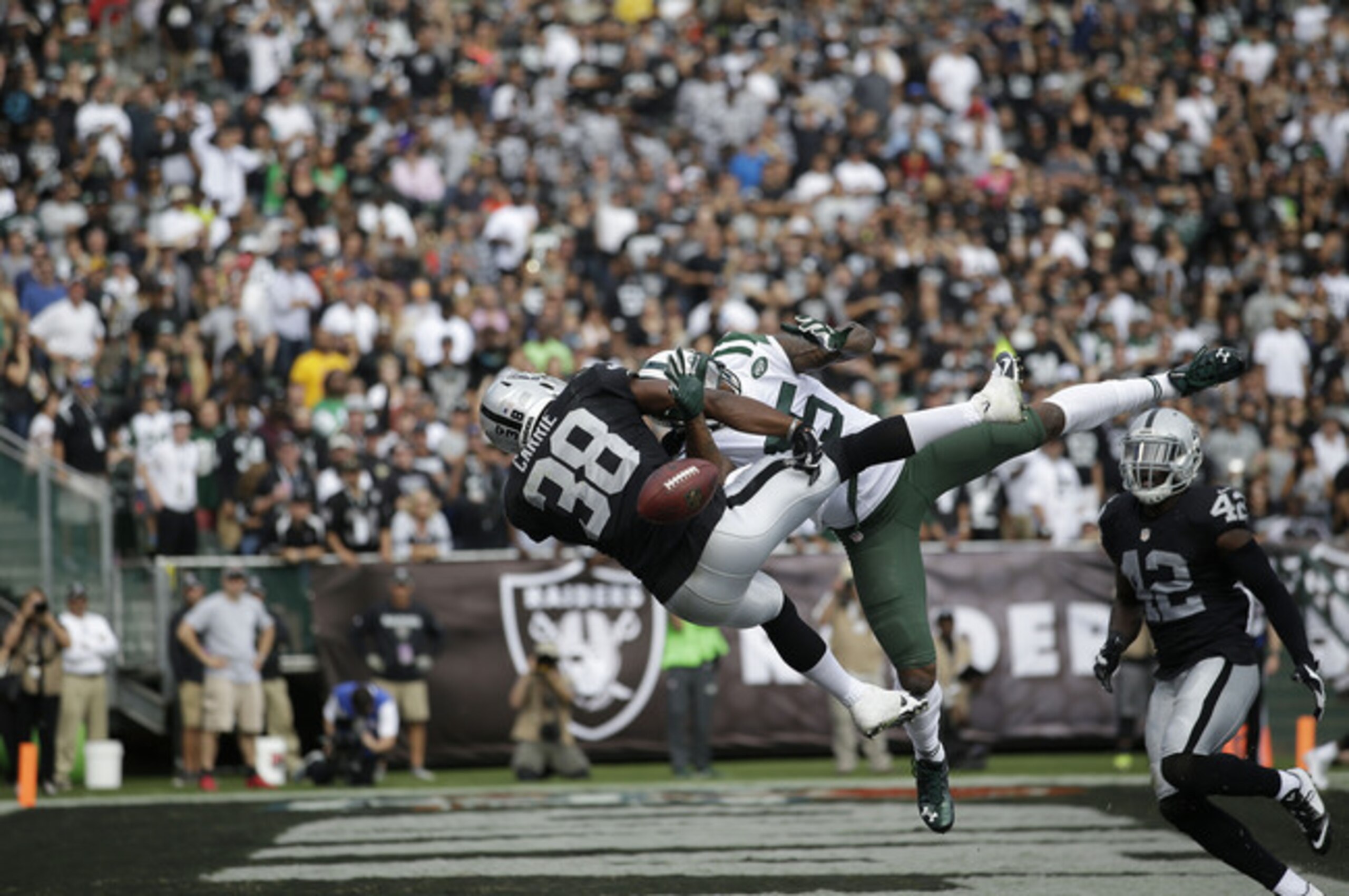 Brandon Marshall goes up but doesn't come down with an end-zone grab.