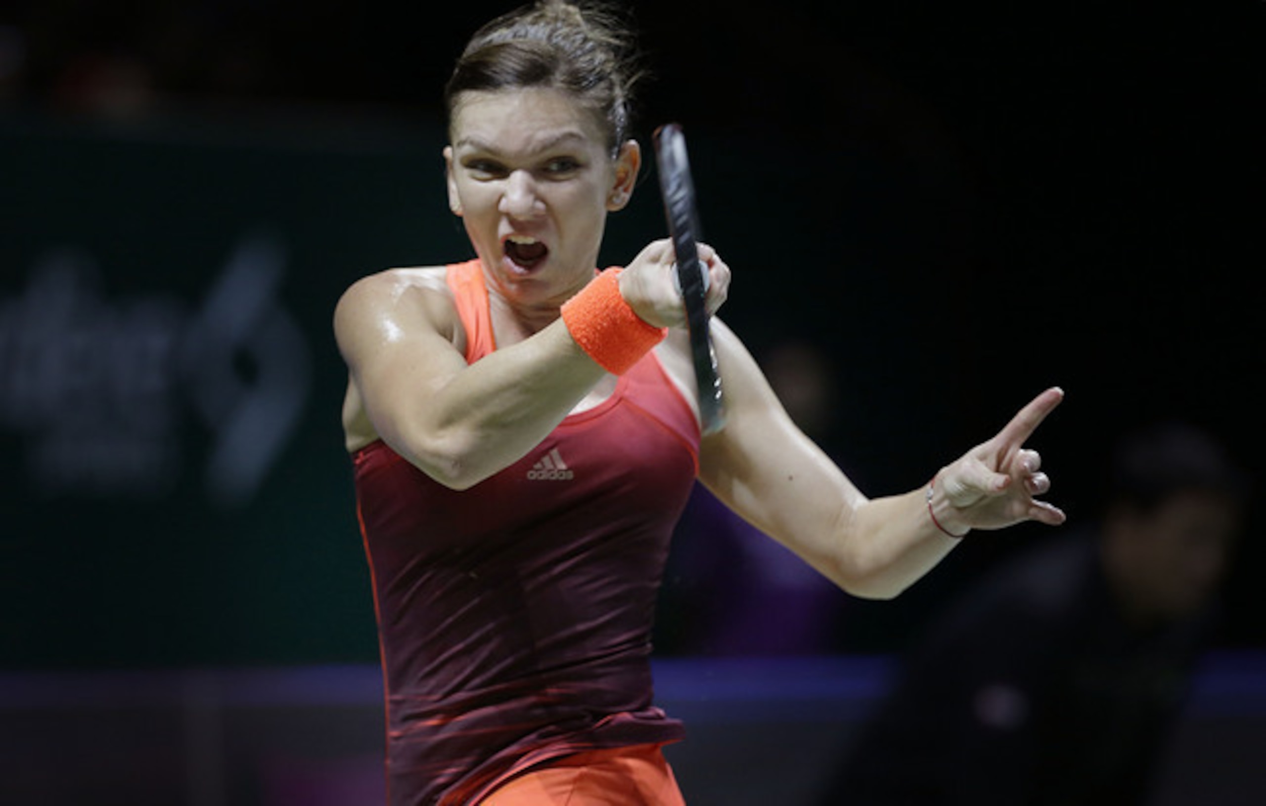 Simona Halep rips a forehand during the 2015 WTA Finals in Singapore. Simona Halep rips a forehand during the 2015 WTA Finals in Singapore.